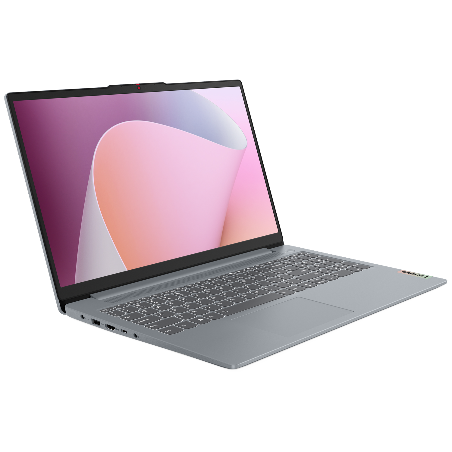 An open gray laptop with a keyboard and screen displaying a pink and purple background.