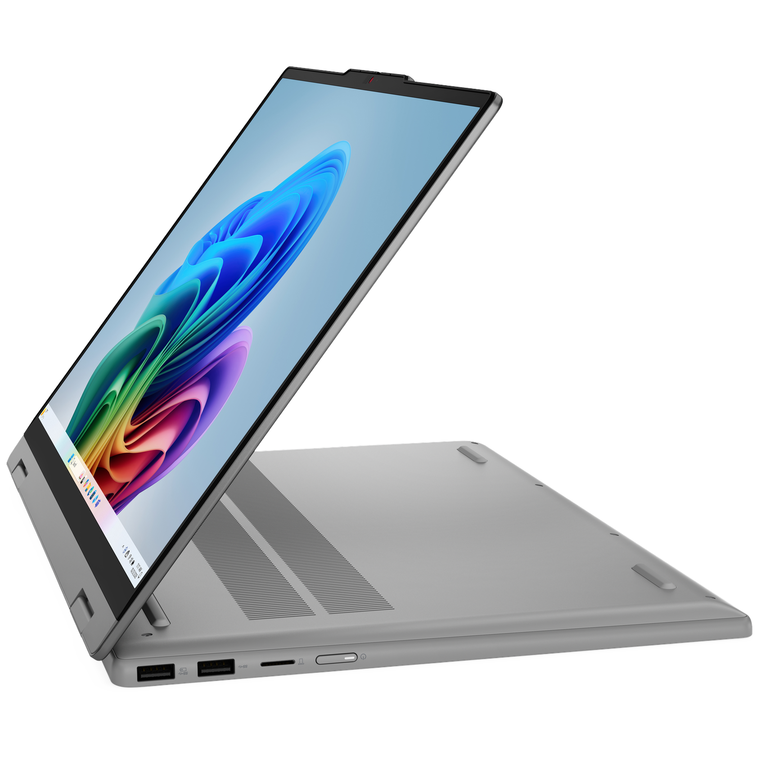 An open, silver laptop showing a colorful desktop wallpaper on its screen.