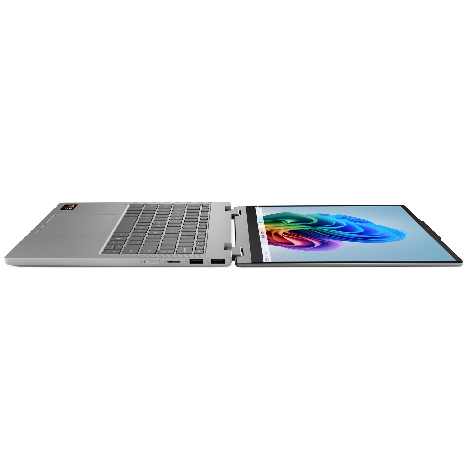 An open silver laptop with a colorful screen display on a white background.