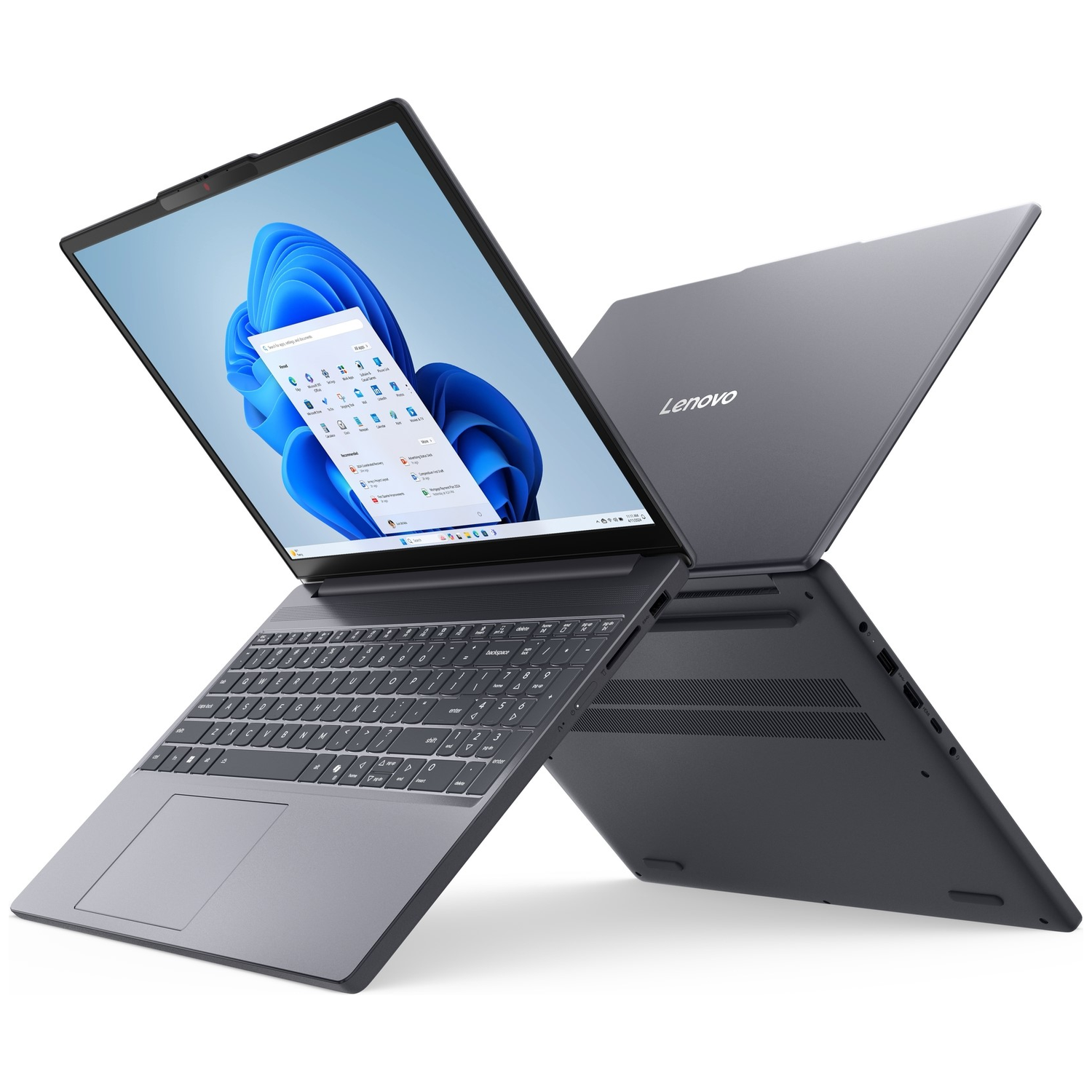 A dark grey Lenovo laptop is open, showing a blue Windows 11 start menu on screen.