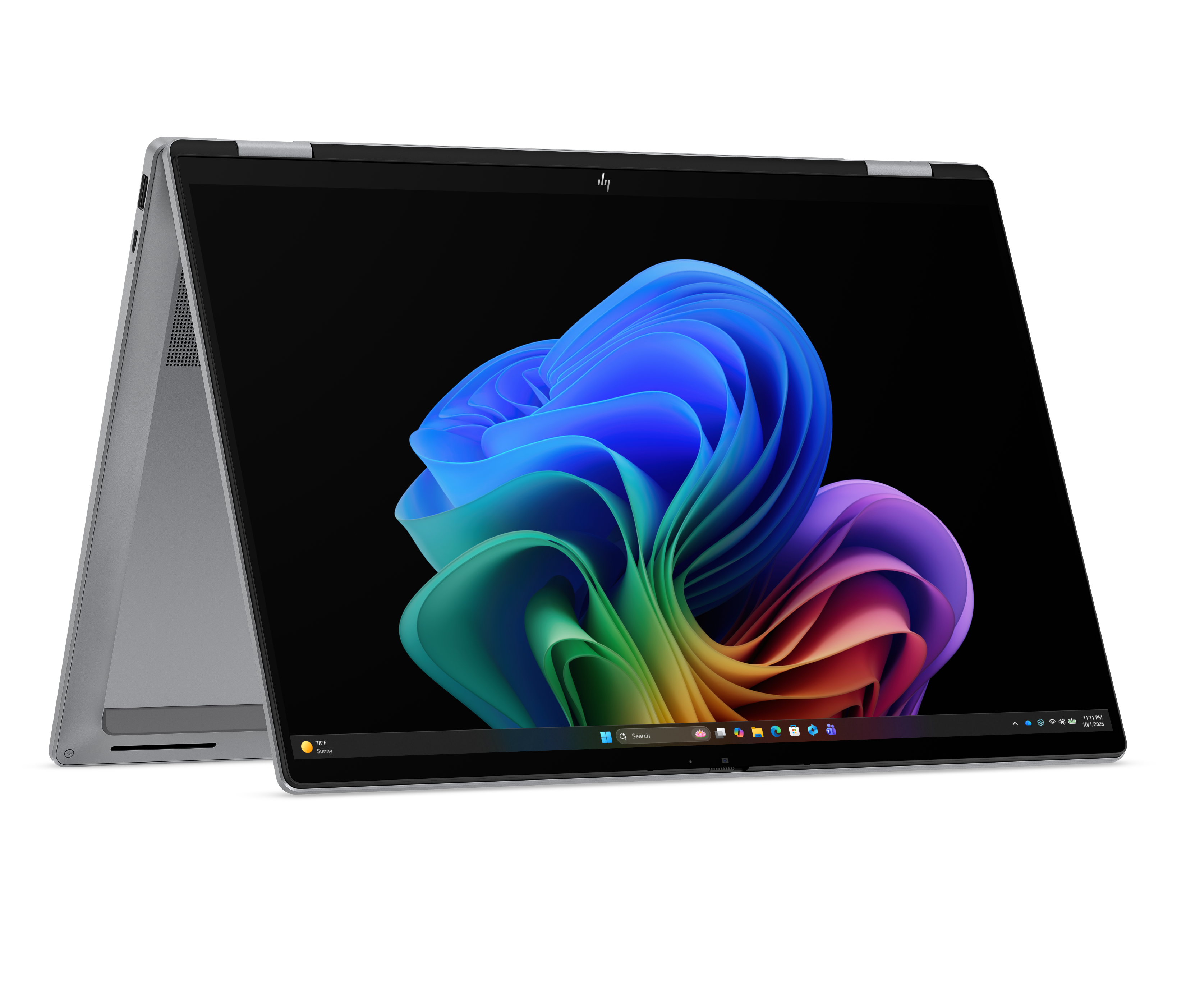 Srebrny laptop z otwartym ekranem wyświetlającym kolorową tapetę.