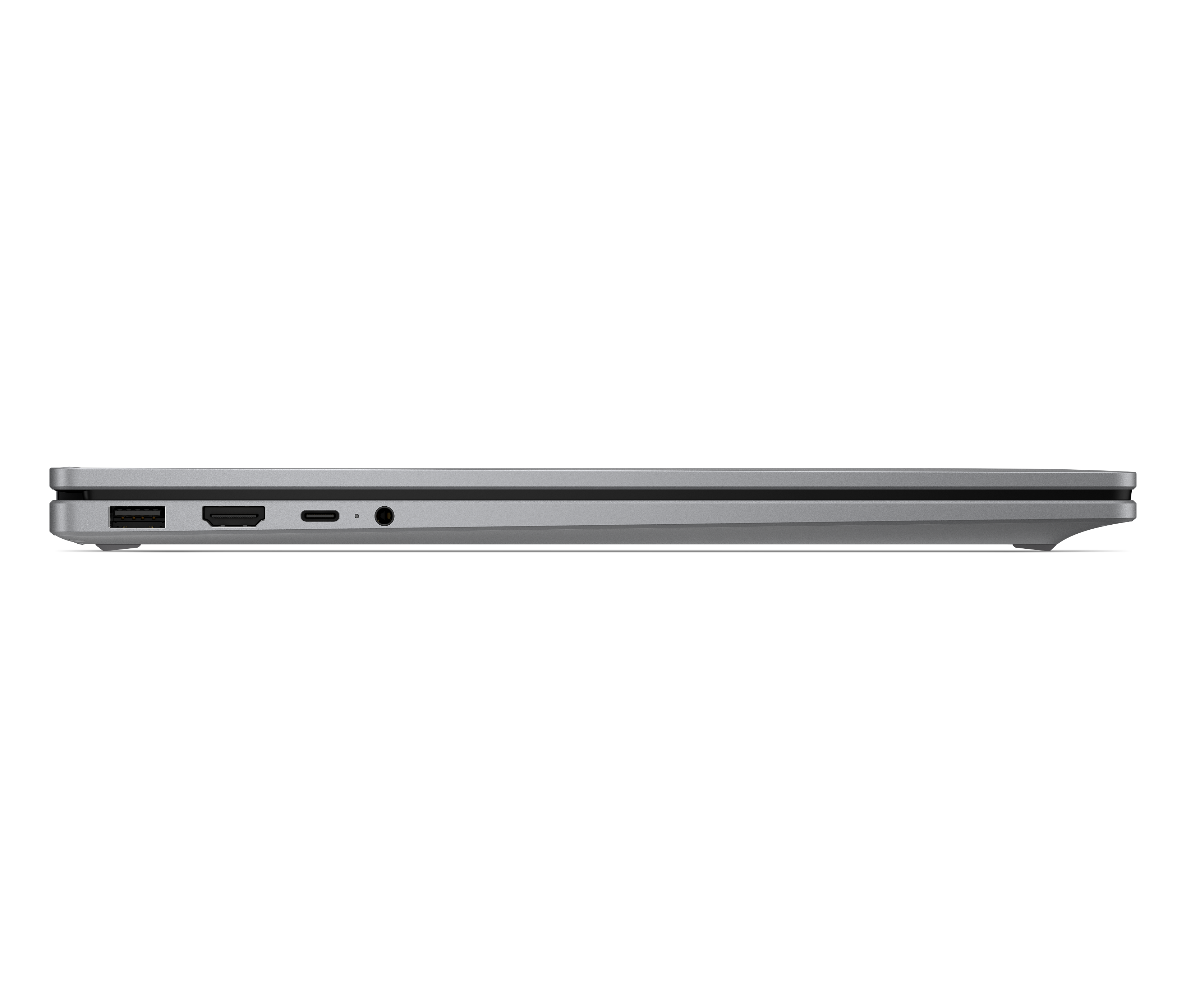Srebrne porty laptopa: USB, HDMI, USB-C i gniazdo słuchawkowe.