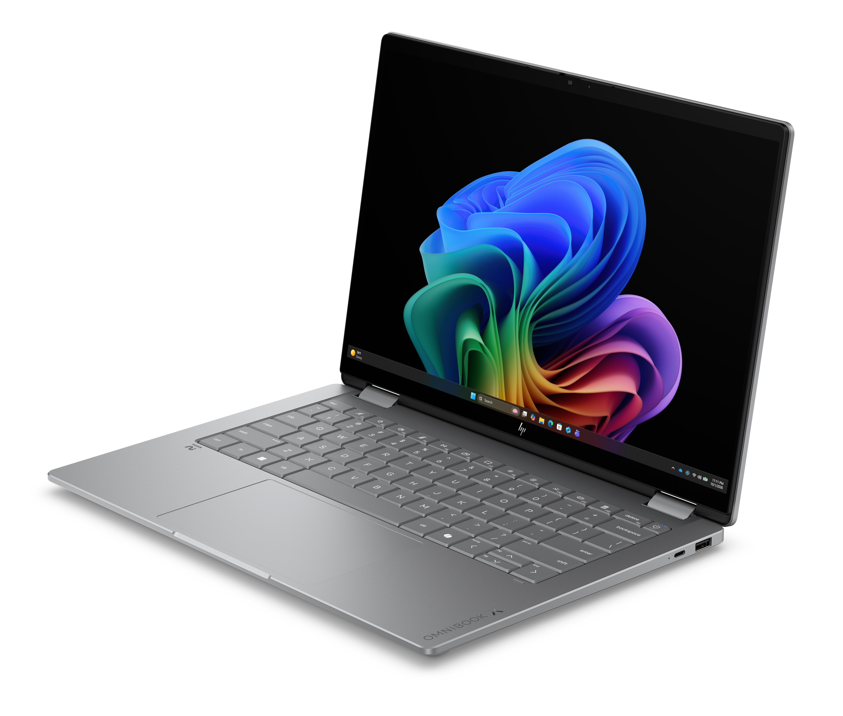 Ein silberner Laptop mit einem bunten Hintergrund auf dem Bildschirm.