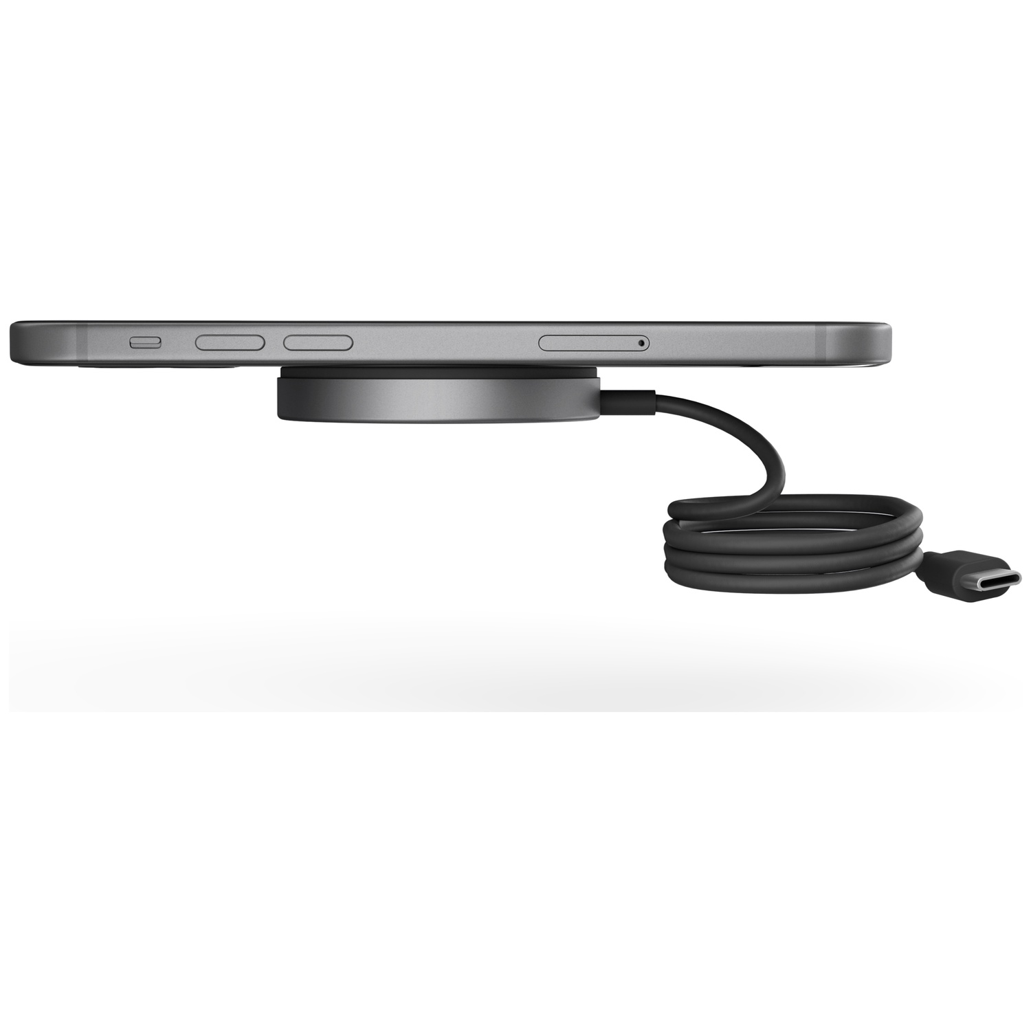 A gray smartphone charging wirelessly with a coiled black cable, viewed from the side on a white background.
