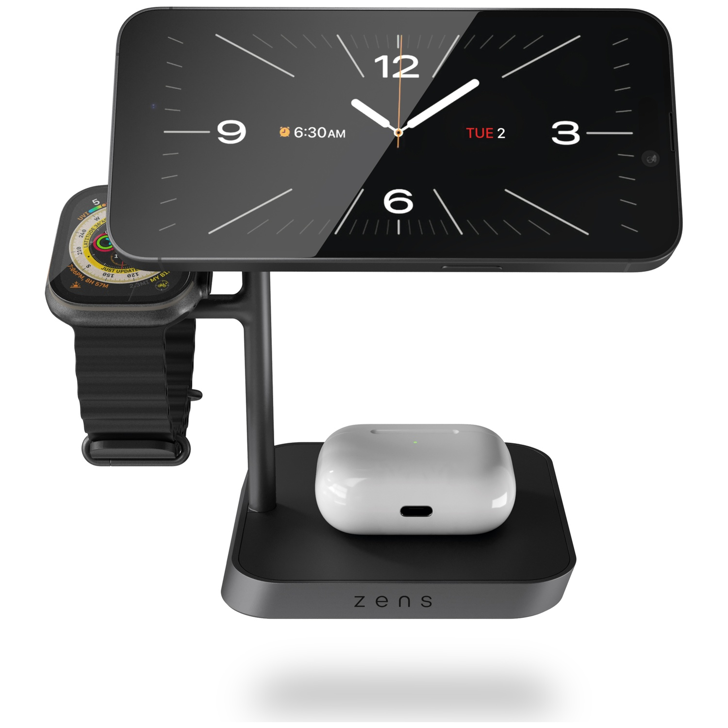A black charging stand holds a smartphone, smartwatch, and white earbuds case.