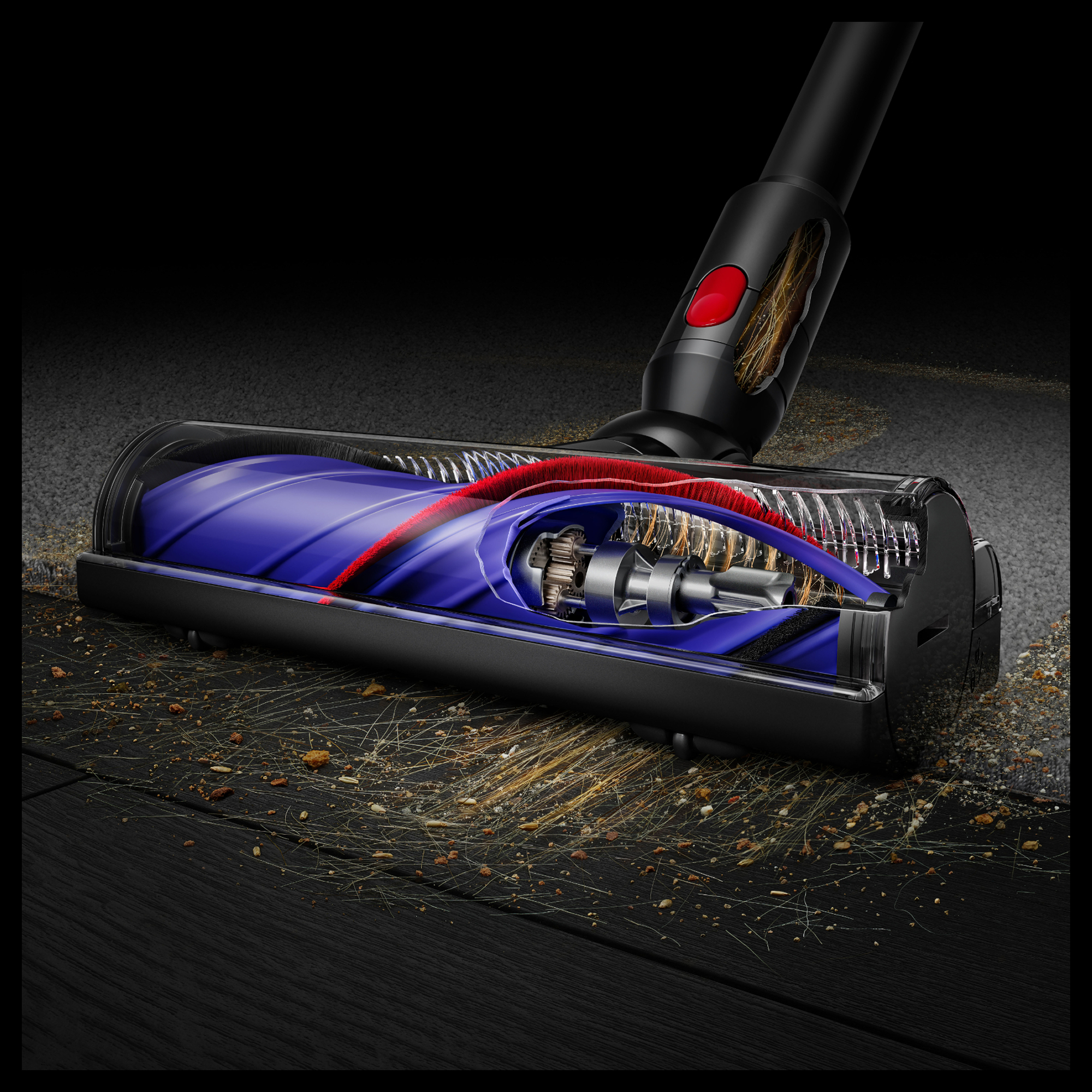 Ein Dyson-Staubsaugerkopf mit transparentem Gehäuse zeigt die Bürste und das Getriebe.