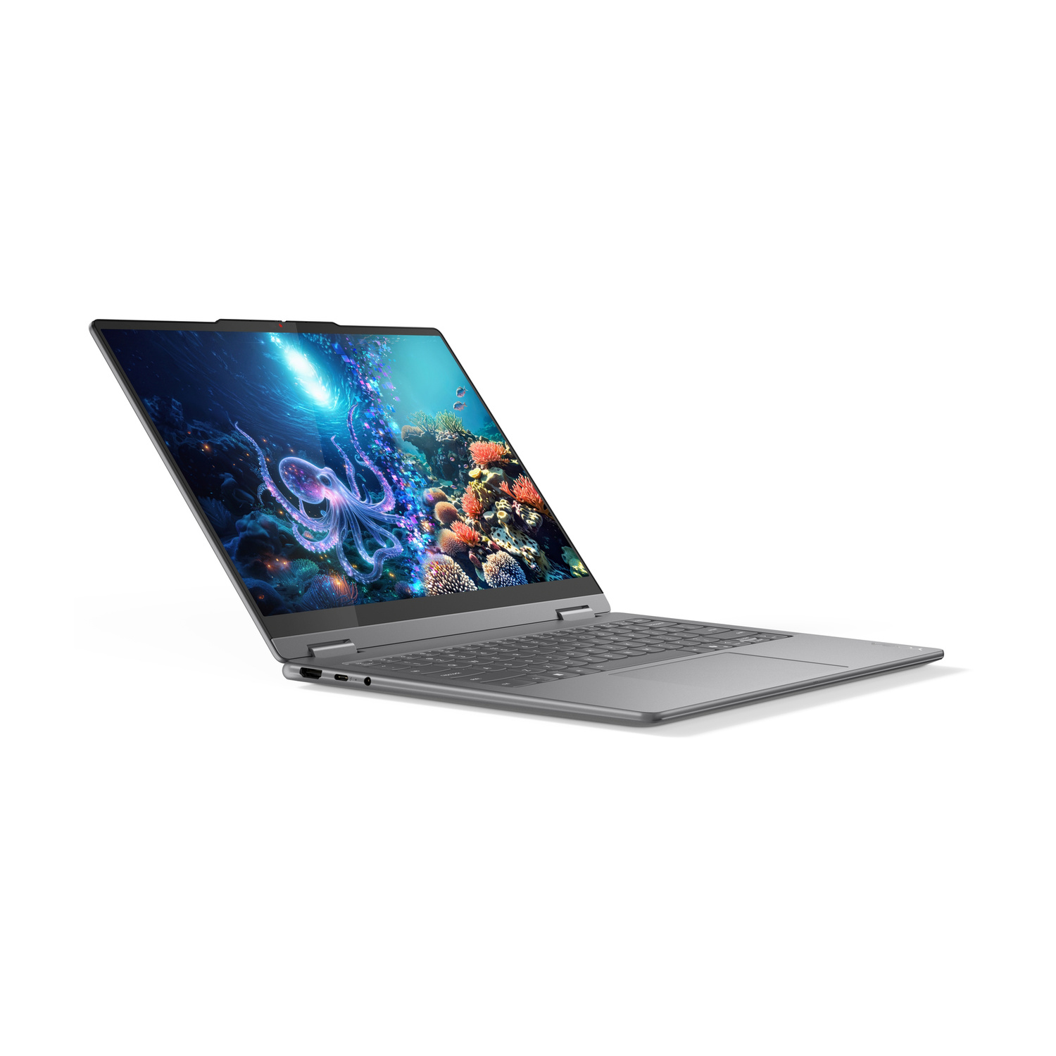 Laptop grigio con salvaschermo oceano: polpo, corallo, pesci.