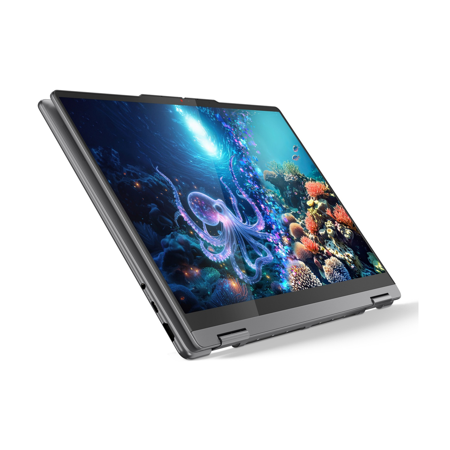 Un laptop grigio con schermo subacqueo raffigurante polpo e coralli.