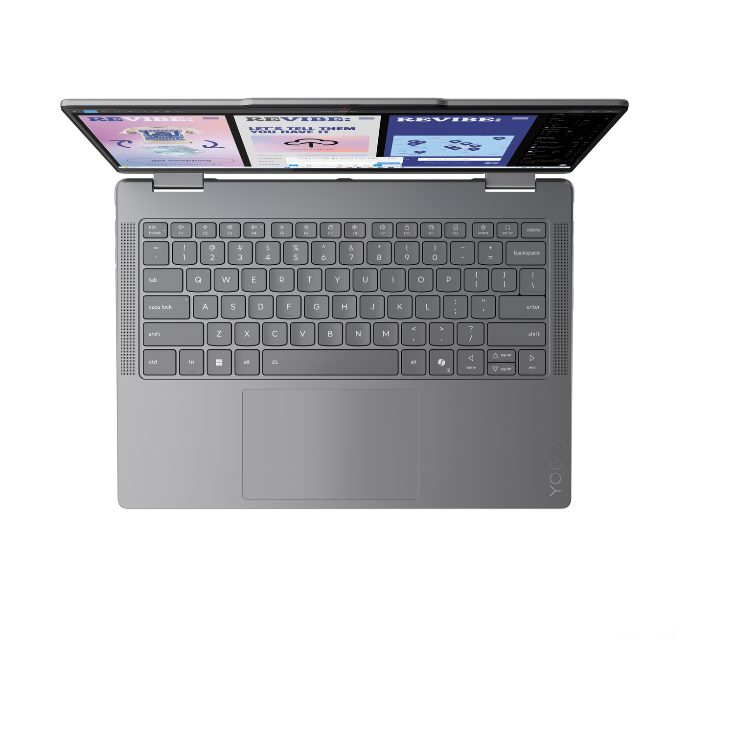 Un laptop argentato con doppio schermo aperto, che mostra pagine web. La tastiera e il trackpad sono visibili.
