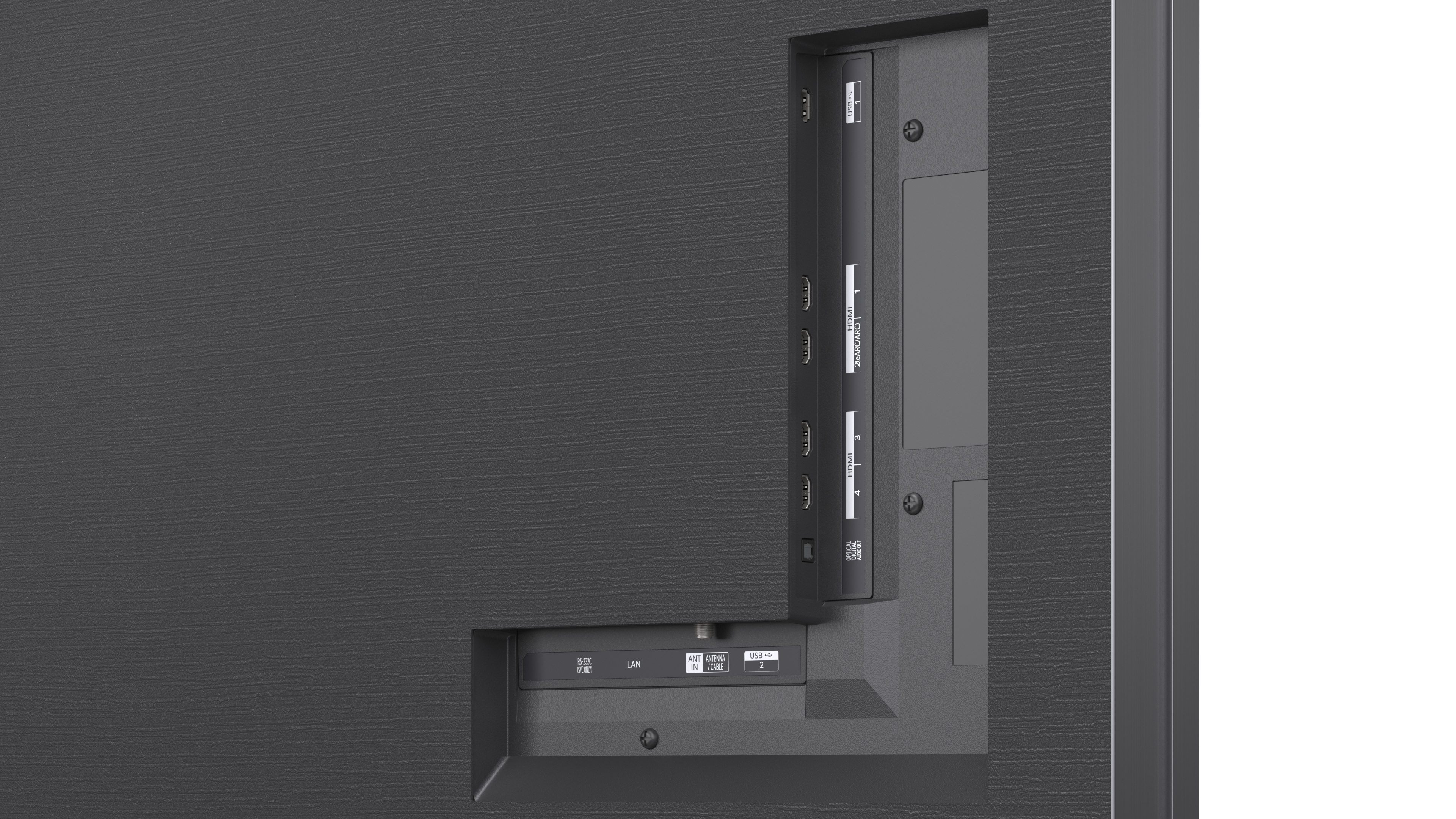 Anschlusspanel mit HDMI-, USB-, LAN- und Antennenanschlüssen an einem grauen Gerät.