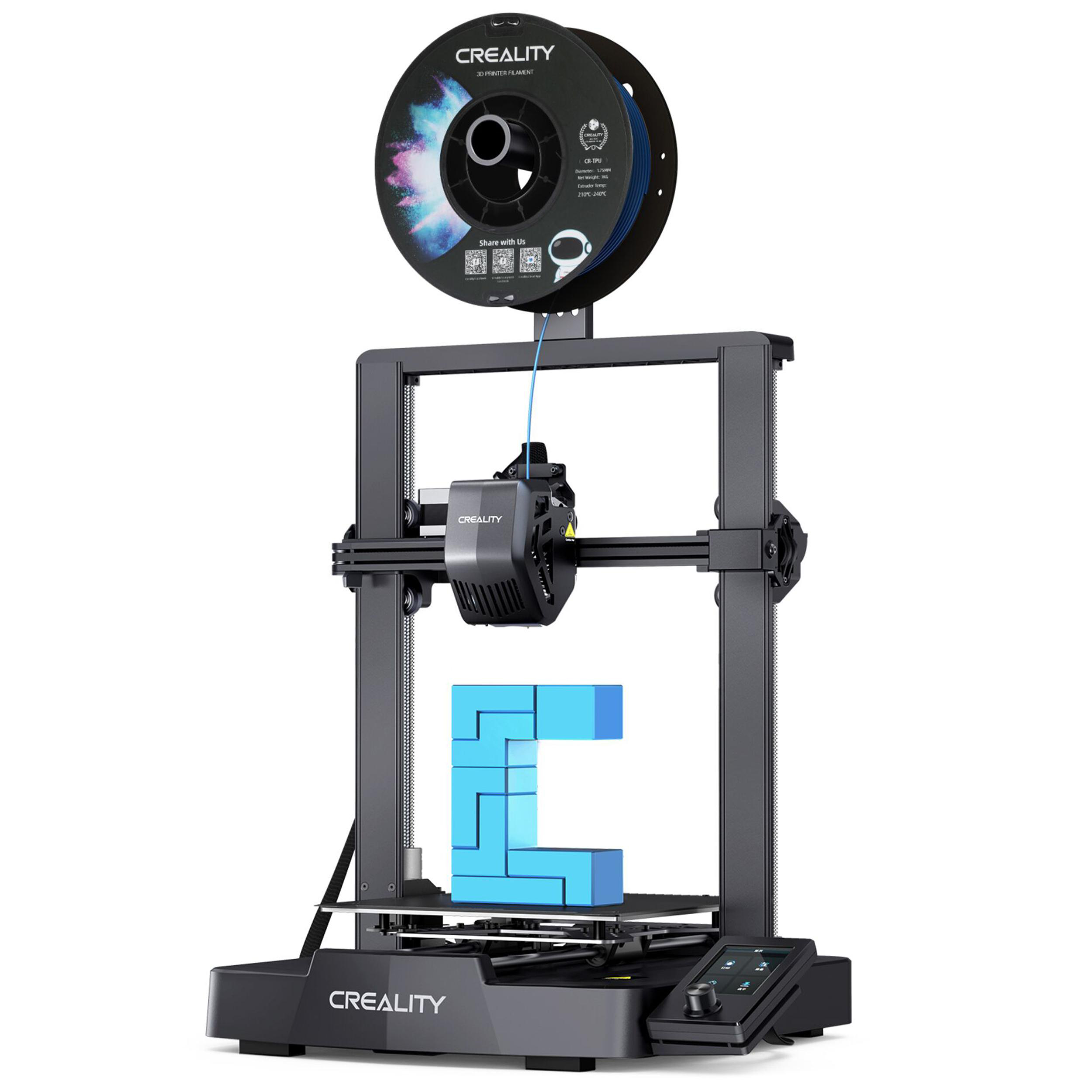 Ein 3D-Drucker druckt ein blaues Objekt, mit Filamentrolle oben.