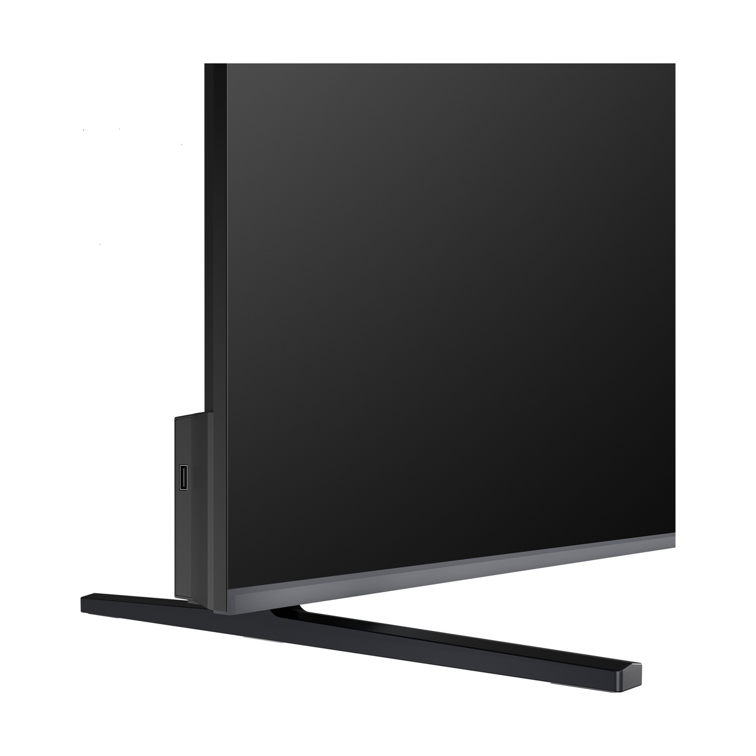 Una TV moderna a schermo piatto con supporto nero e porta USB laterale.