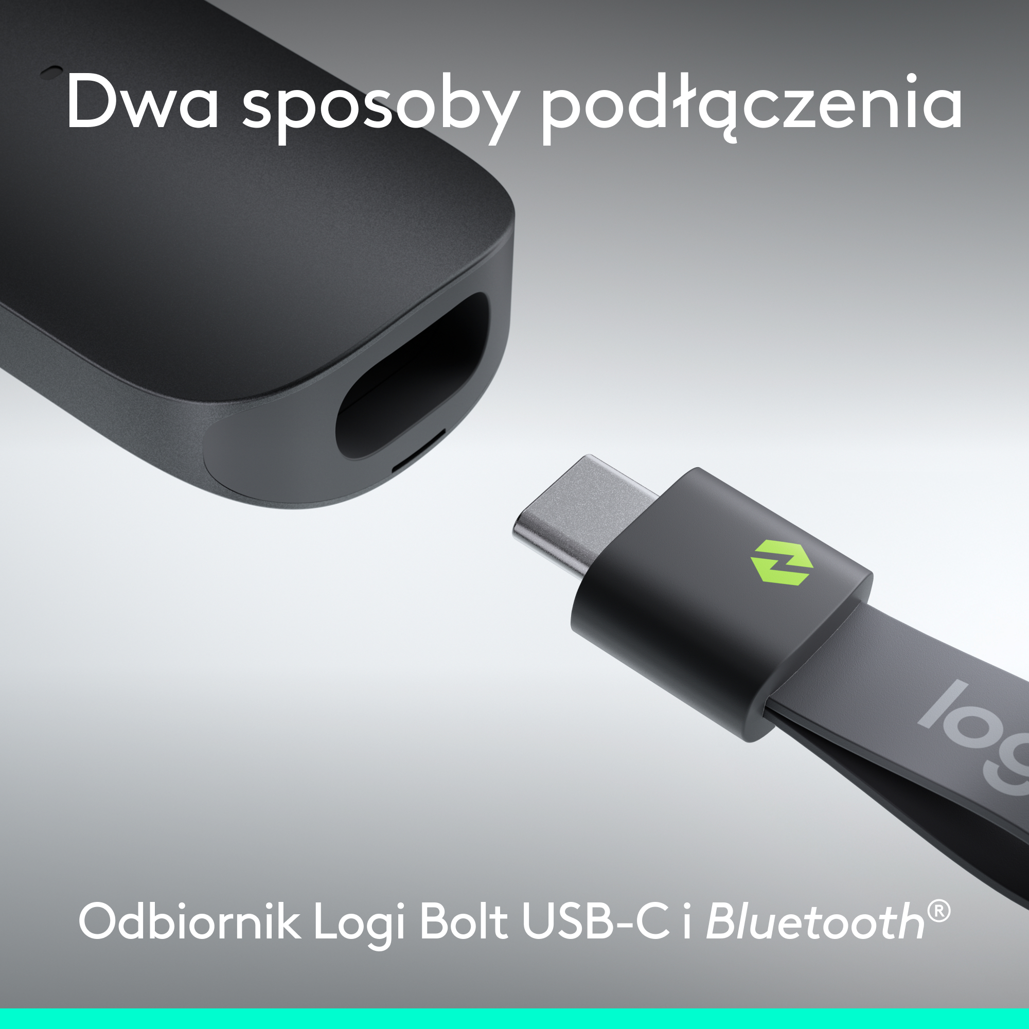 Wtyczka USB-C z zielonym logo jest wkładana do czarnego urządzenia.