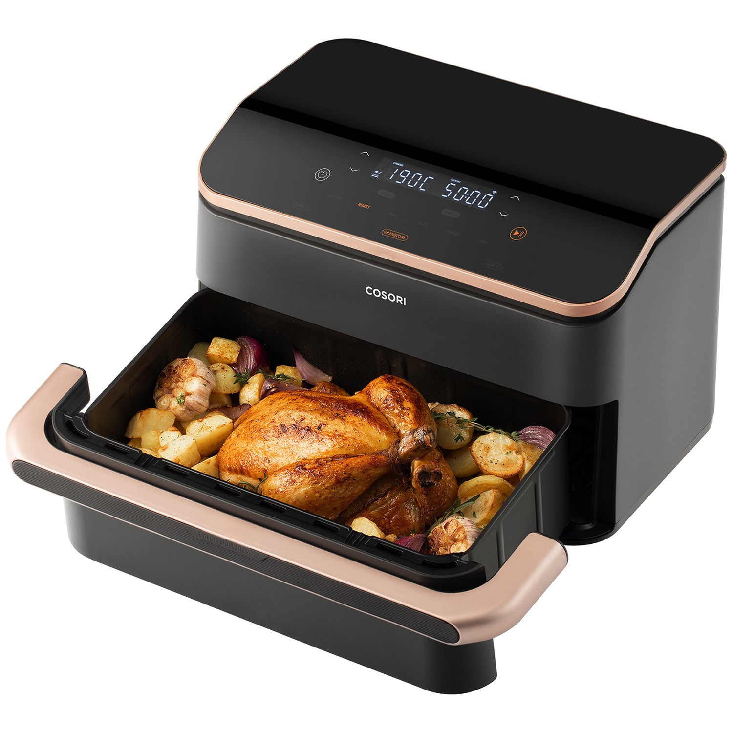 Un poulet rôti avec pommes de terre et oignons dans une friteuse à air noire.