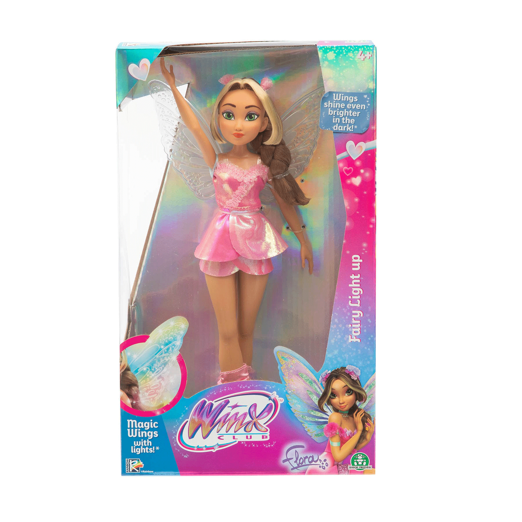 Egy Winx Club tündér baba rózsaszín ruhában, világító szárnyakkal a csomagolásában.