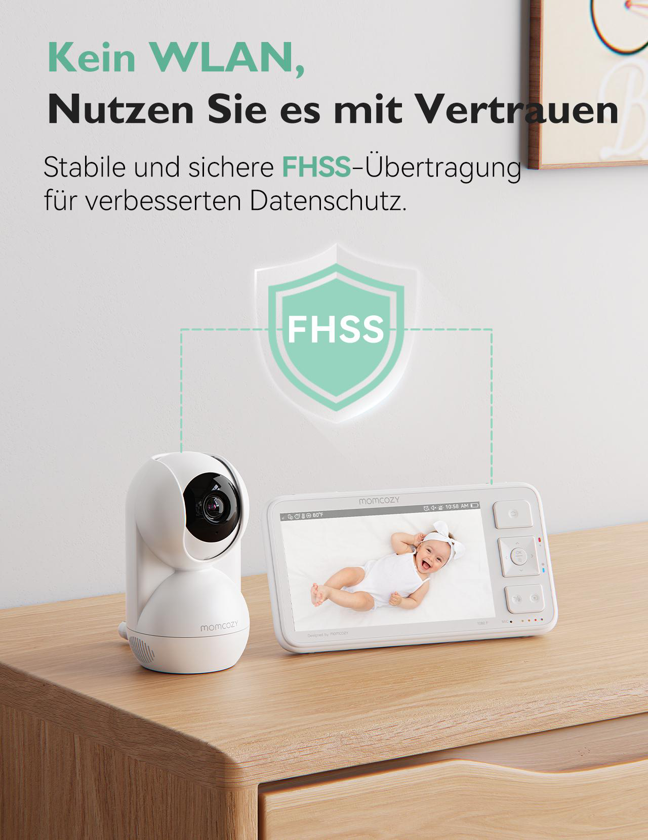 Ein weißer Baby Monitor mit Kamera und Bildschirm, der ein Baby zeigt.