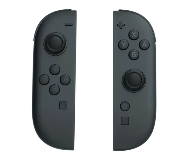 Dwa ciemnoszare kontrolery Joy-Con obok siebie na białym tle.