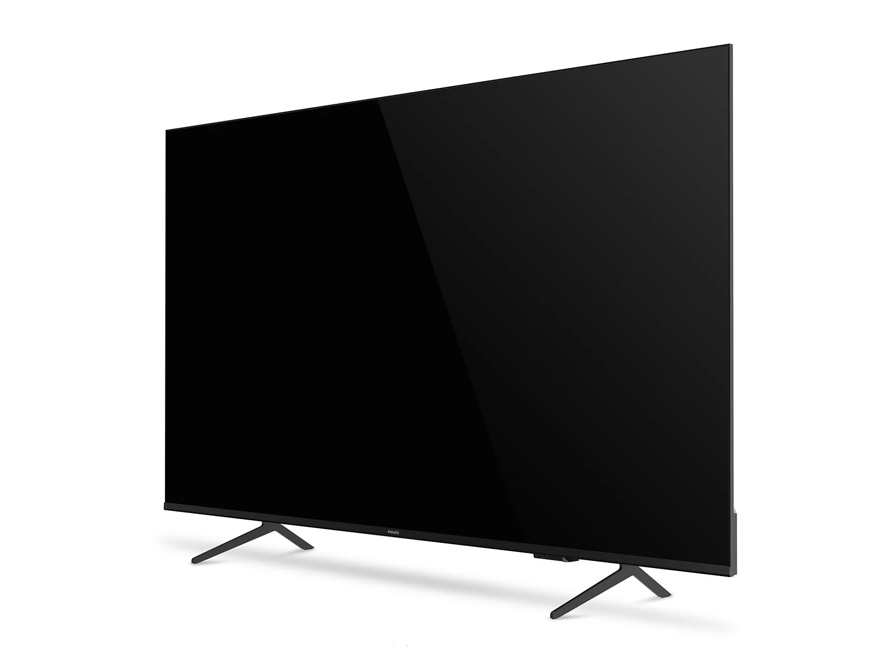 Un elegante televisor negro con bisel delgado se apoya en dos patas plateadas.