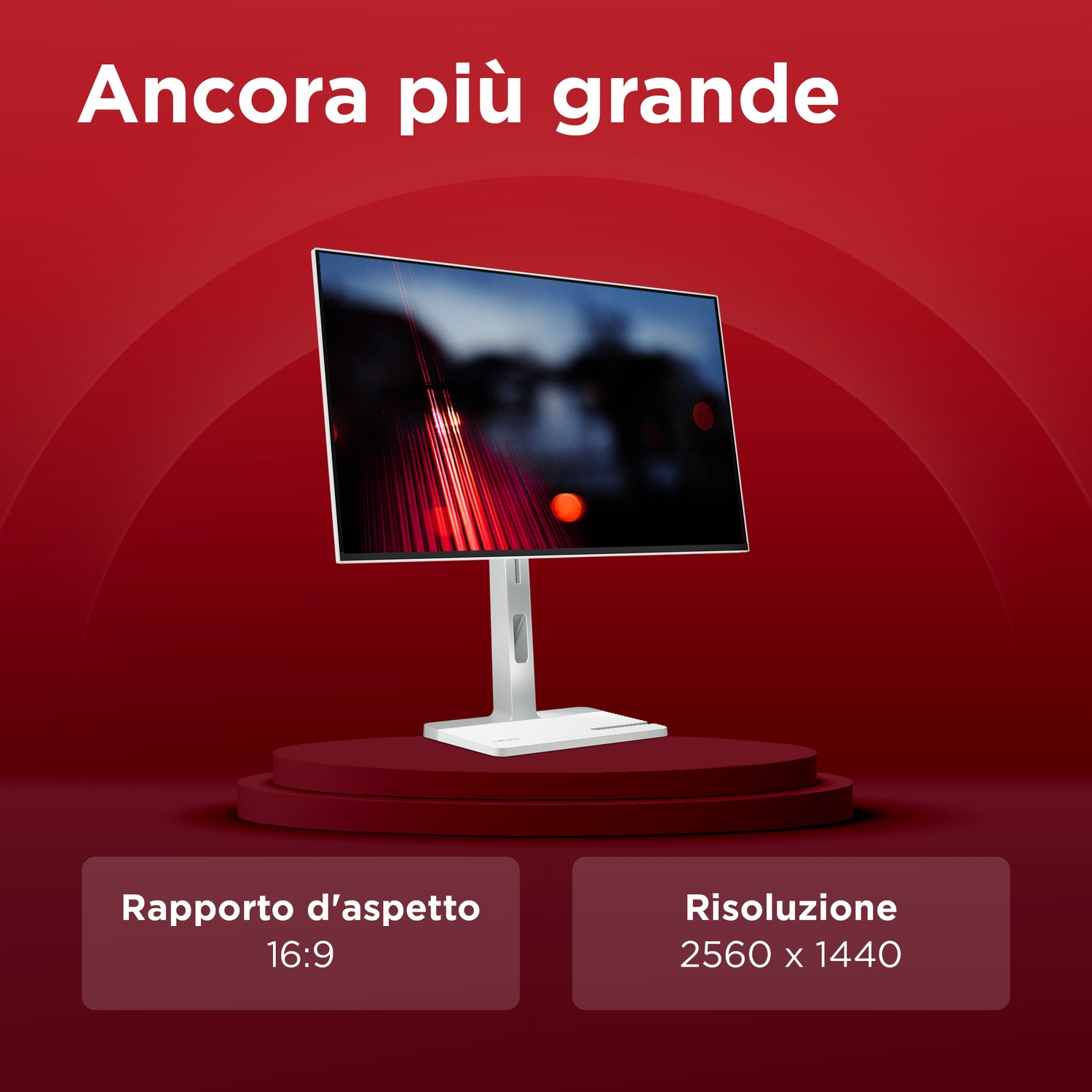 Un monitor moderno con sfondo astratto, aspect ratio 16:9, risoluzione 2560x1440.
