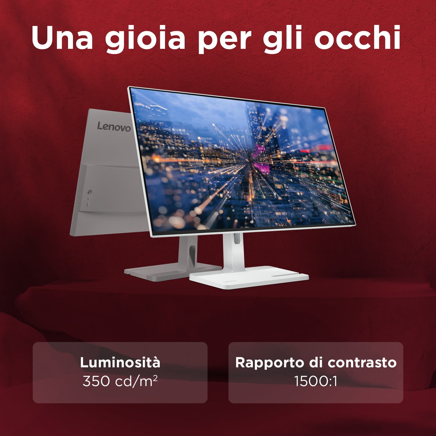 Un monitor Lenovo mostra un paesaggio urbano luminoso con specifiche.