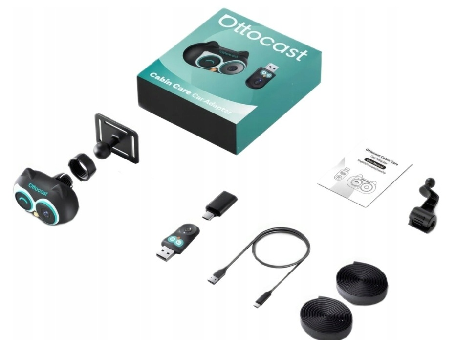 Zestaw adaptera samochodowego Ottocast z kamerą w kształcie sowy, adapterem USB, kablami, mocowaniem i instrukcją.