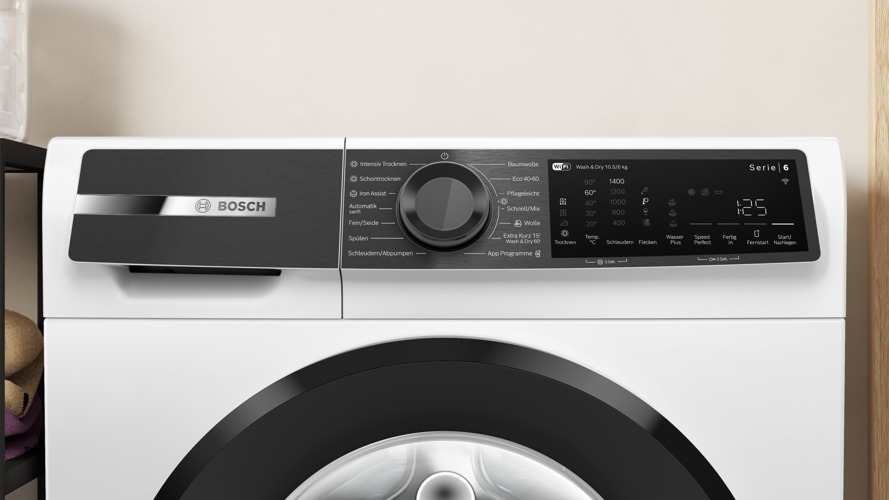 Eine Bosch Waschmaschine mit digitalem Bedienfeld, Programmauswahl und Timer.