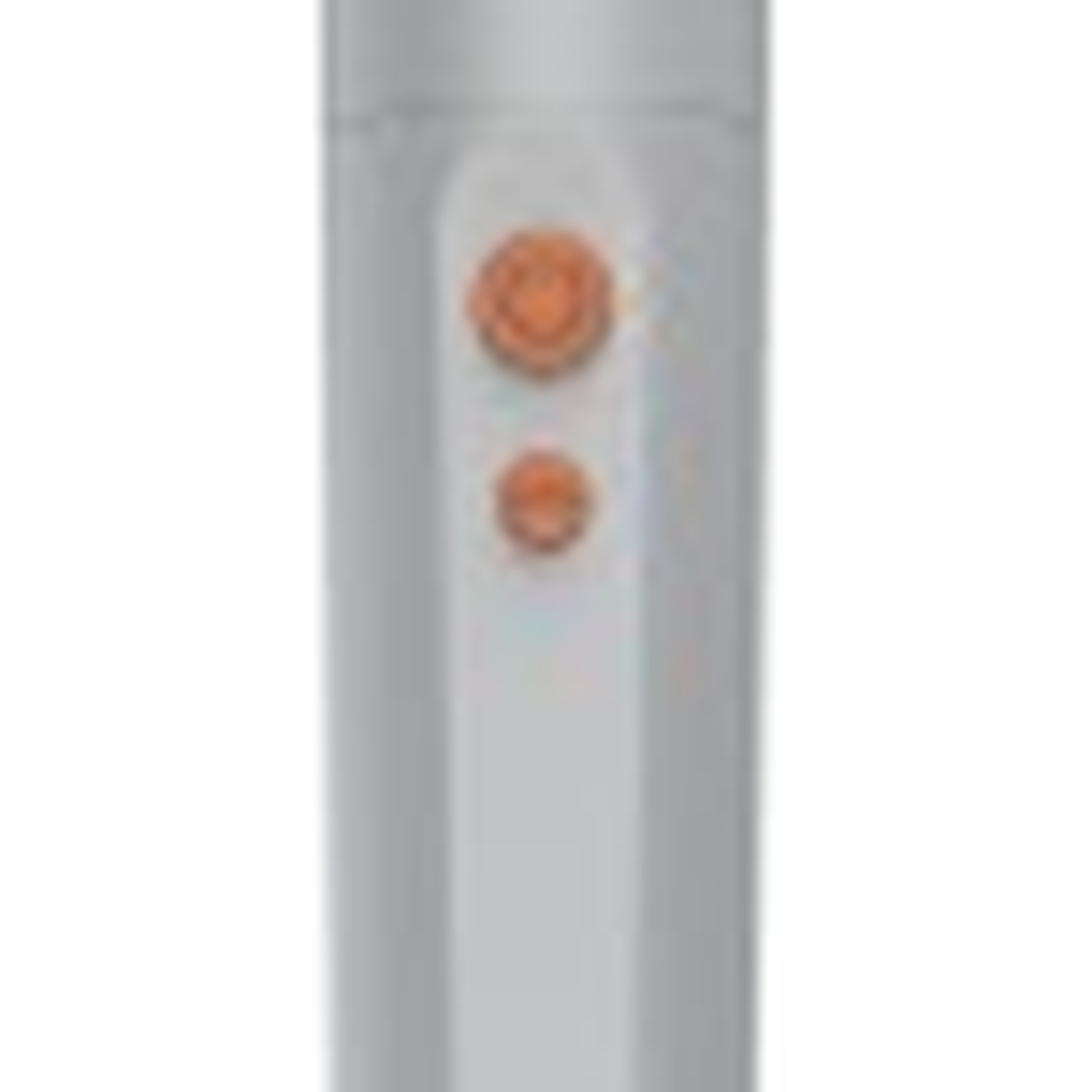 A close-up of a silver cylindrical object with two orange circular buttons.