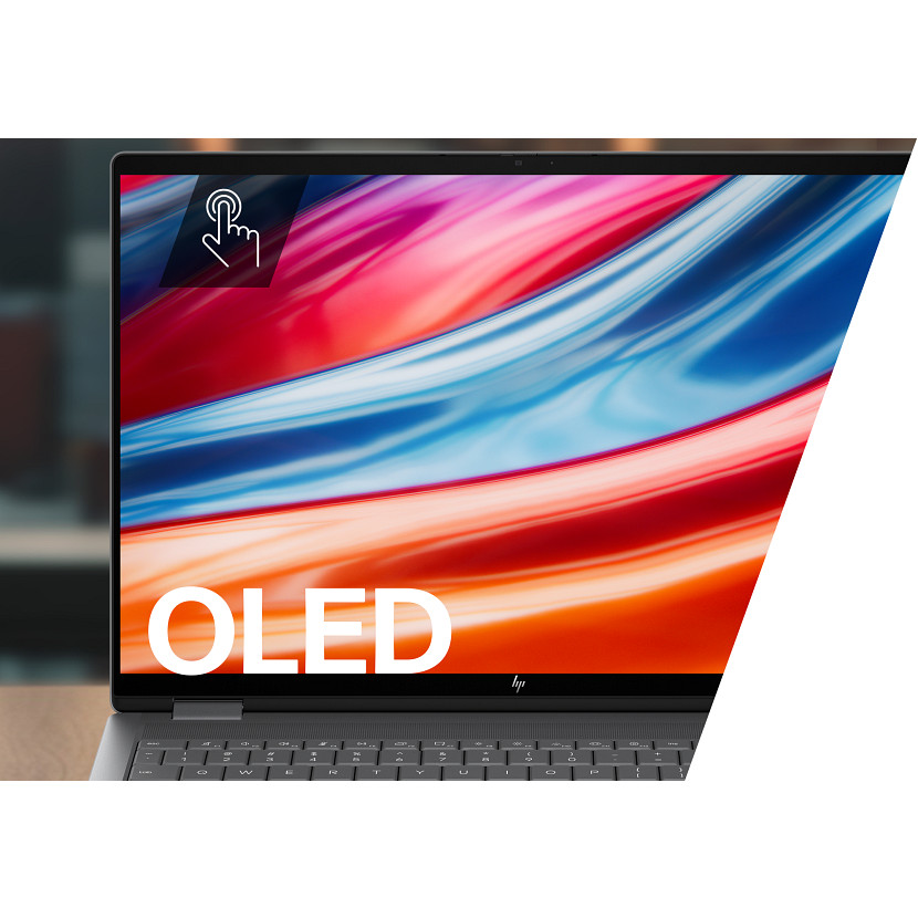 Laptop z kolorowym ekranem OLED, wyświetlający dynamiczne grafiki abstrakcyjne.