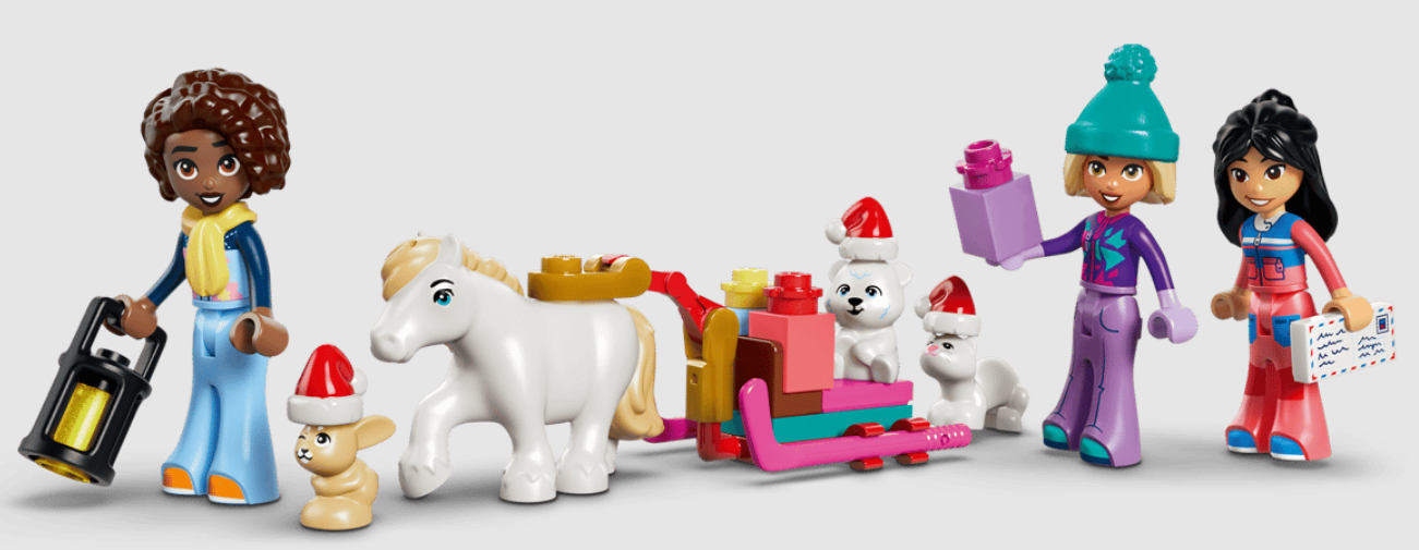 Lego-Figuren mit Pferd, Schlitten, Eisbären und Geschenken. Eine Figur hält eine Laterne.