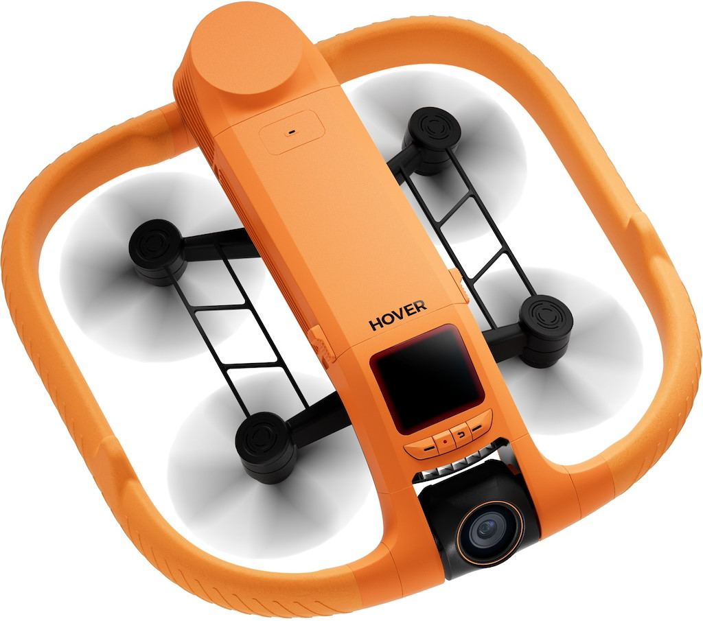 Orange Drohne mit Propellern, Kamera und Bildschirm auf weißem Hintergrund.