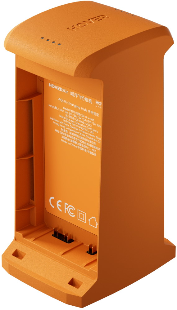 Orangecharging hub mit Ladekontakten und Textinformationen auf der Vorderseite.