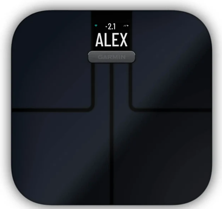 Ciemna waga cyfrowa z napisem „ALEX” i logo Garmin.