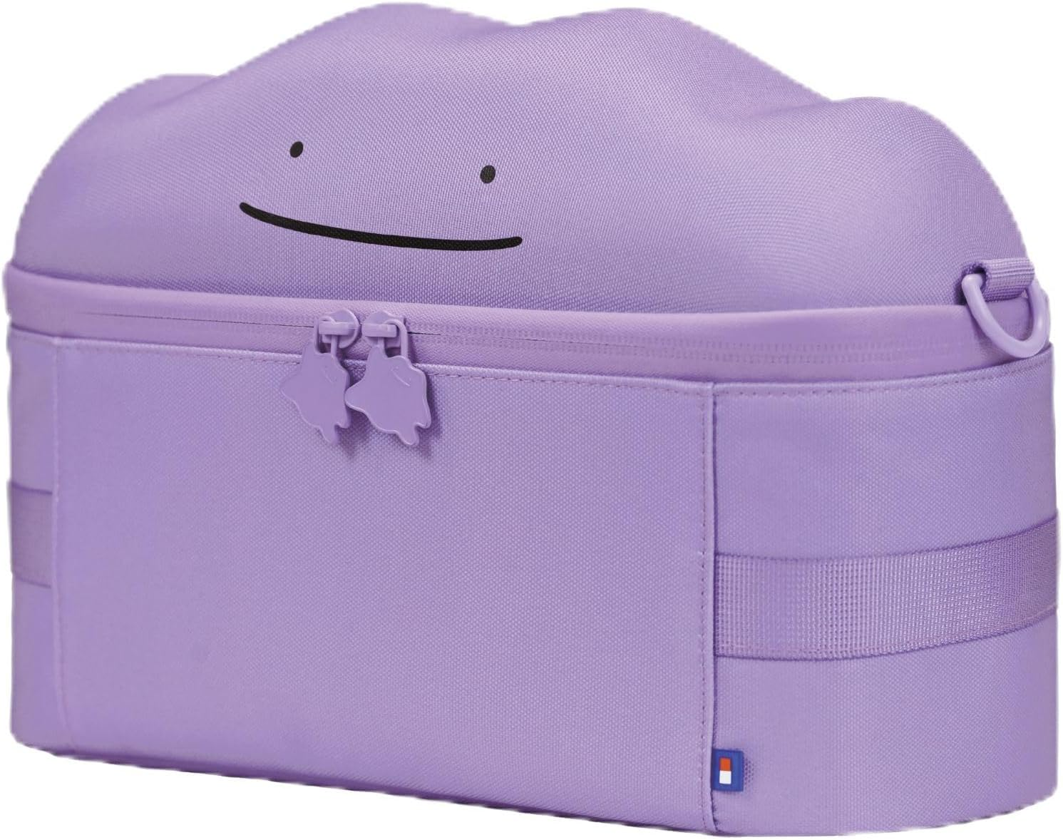 Bolso morado con cara de Ditto y cremallera.