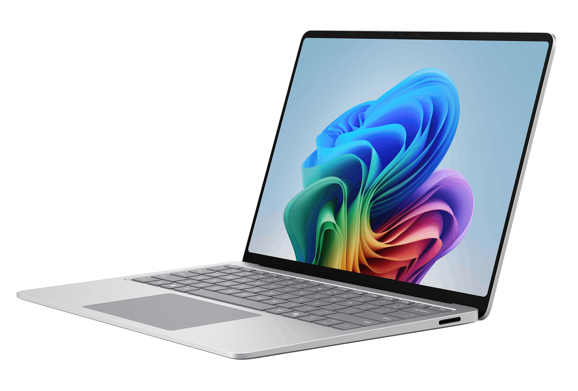 Un portátil plateado con teclado y panel táctil, mostrado sobre fondo blanco.