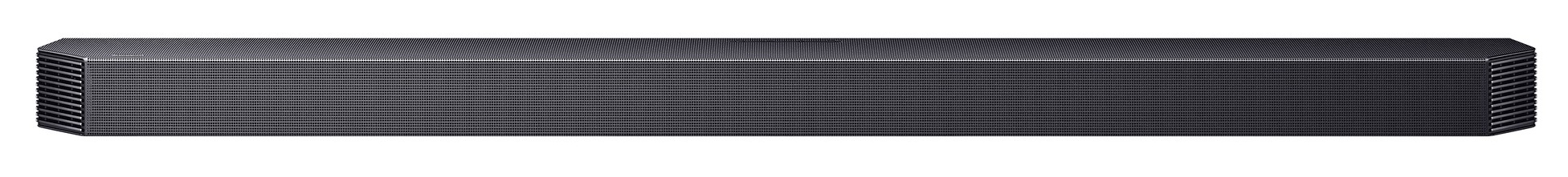 Czarny, smukły soundbar z drobnymi poziomymi żebrami i perforowaną kratką.