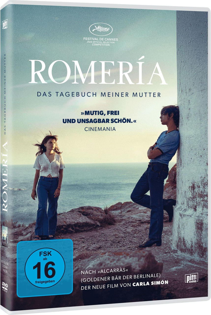 Zwei junge Leute stehen auf einem felsigen Küstenabschnitt vor dem Meer.