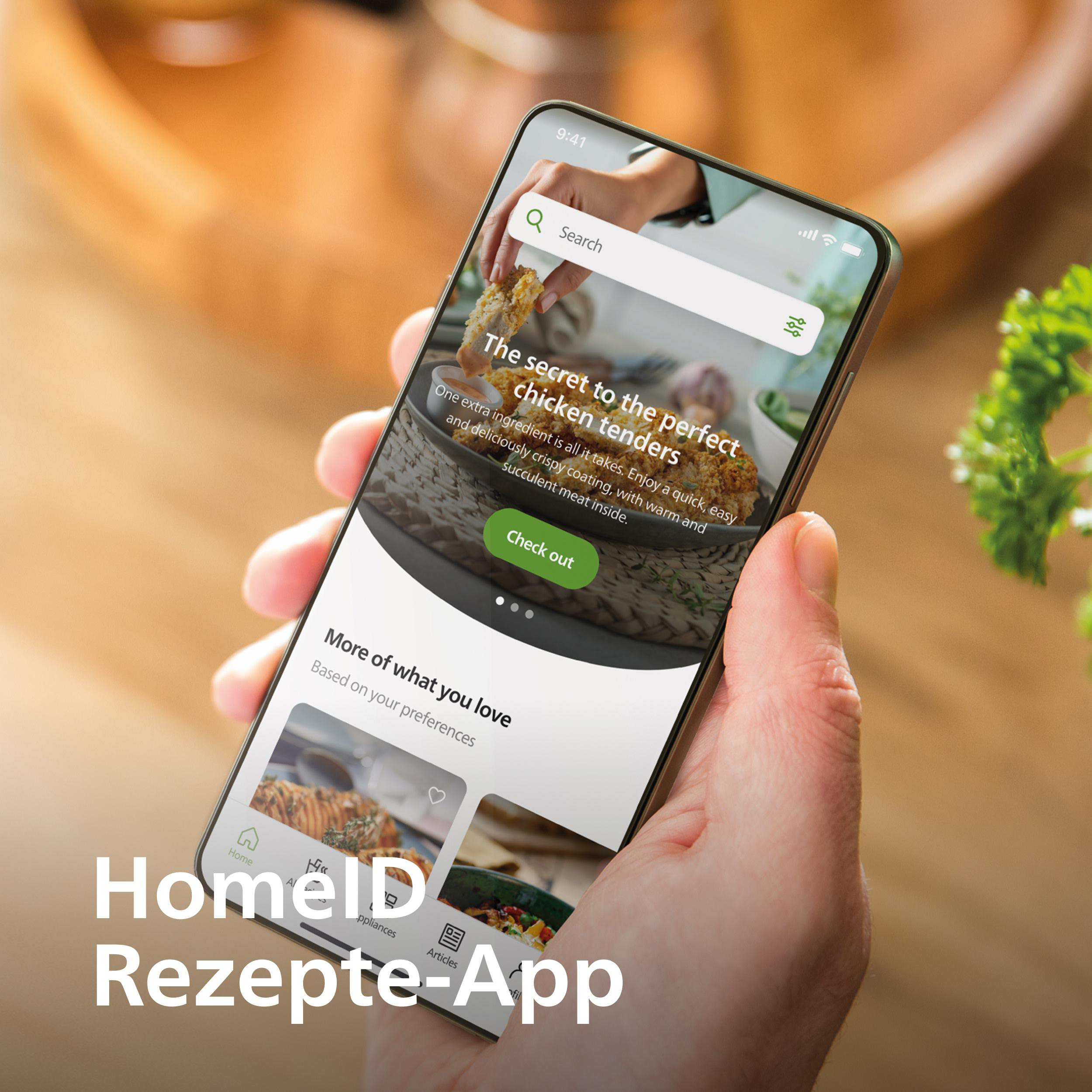 Ein Smartphone zeigt eine Rezept-App mit Hähnchen-Tender-Rezept und Text.