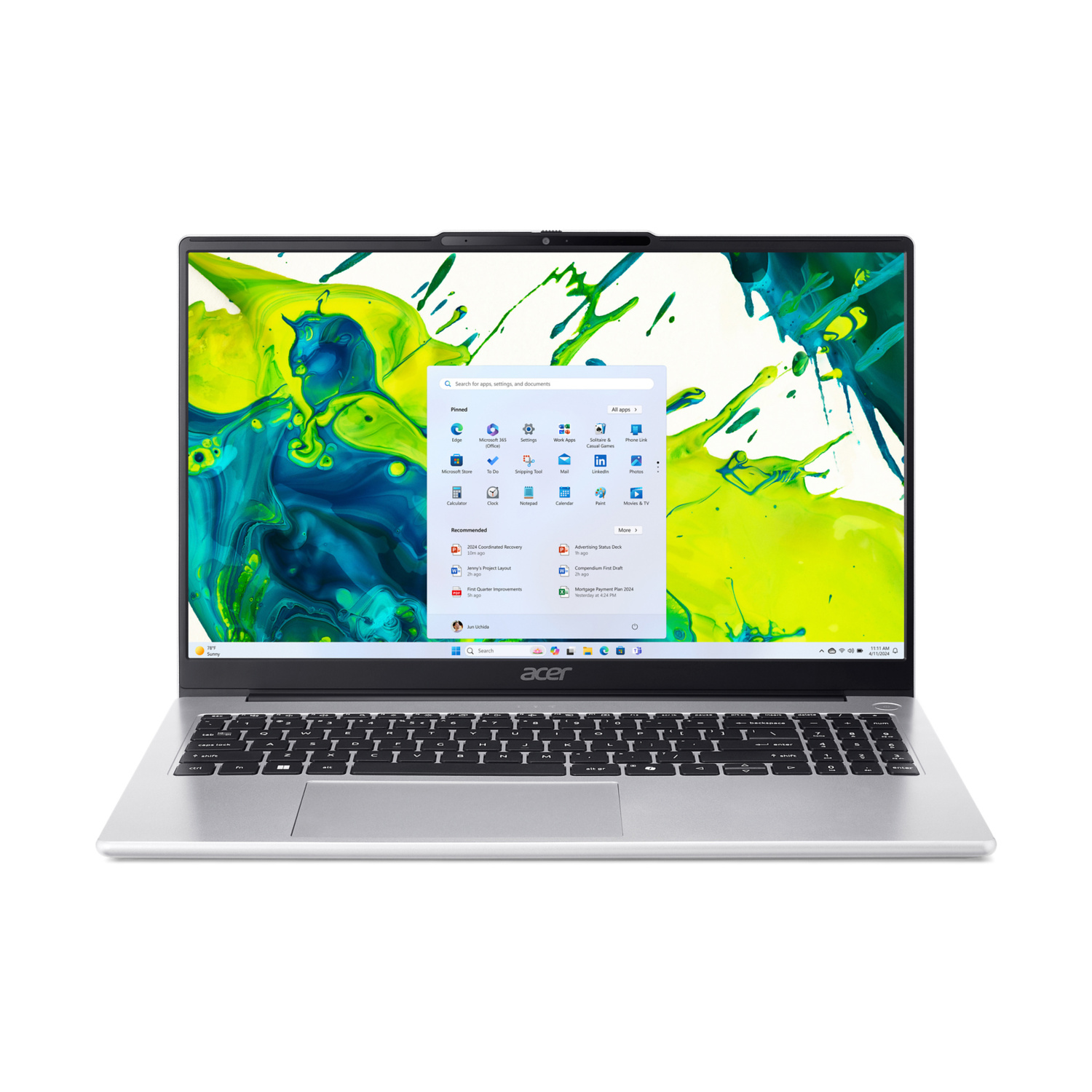 Un laptop Acer argentato con uno sfondo colorato sullo schermo.