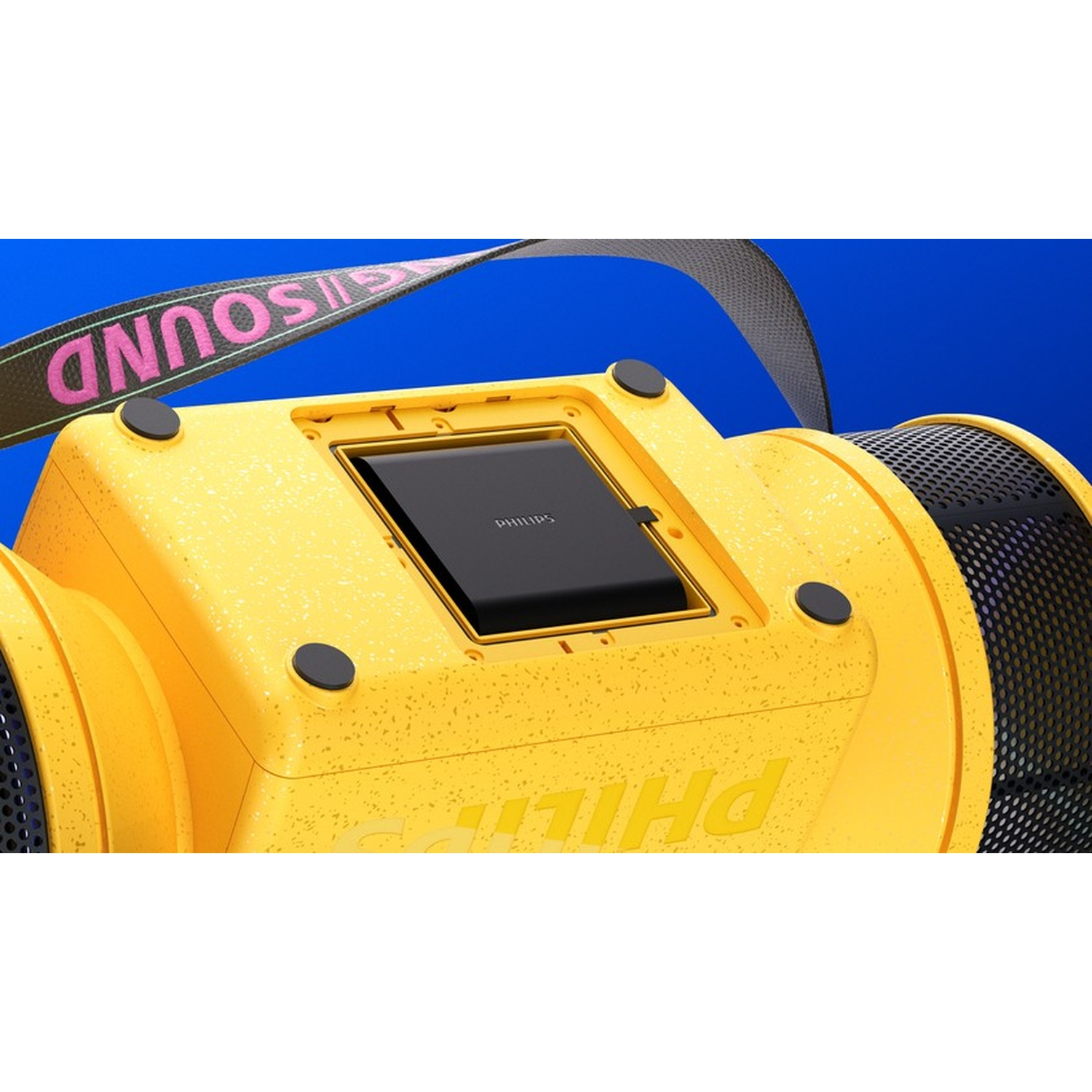 Altoparlante giallo con accenti neri e tracolla 'SOUND' su sfondo blu.
