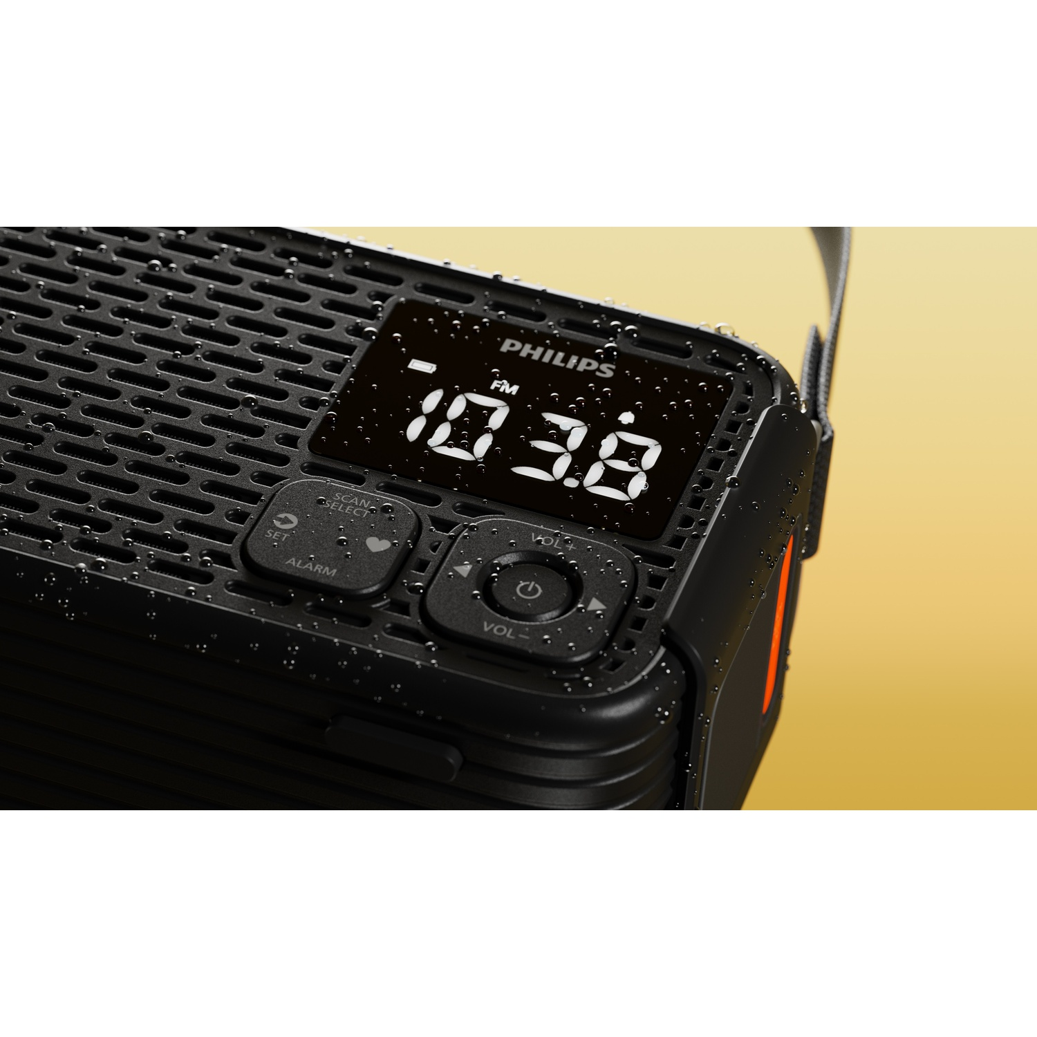 Radio Philips nera con gocce d'acqua, mostra 107.3 FM.
