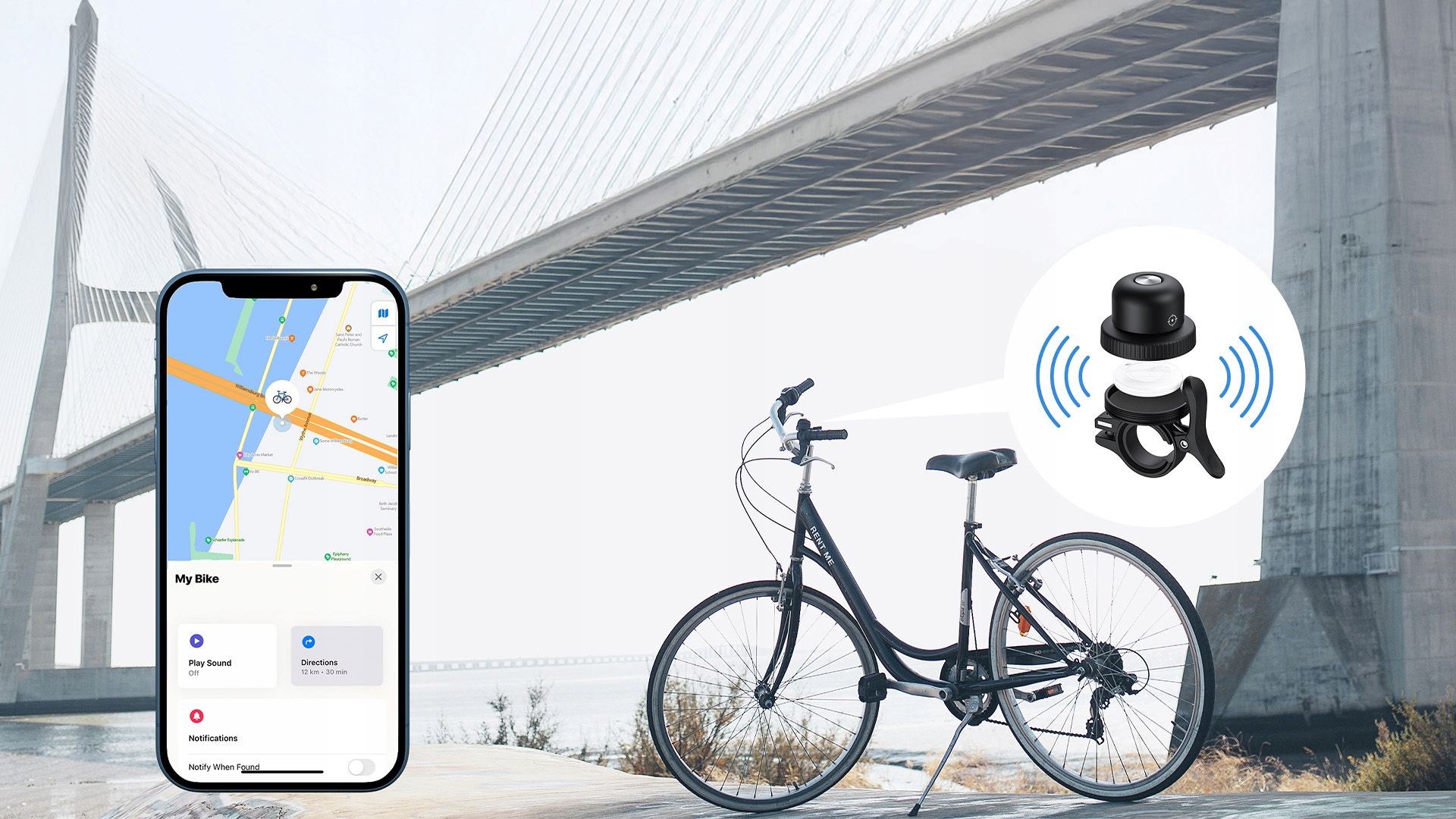 Rower przed mostem, obok telefon z aplikacją rowerową.