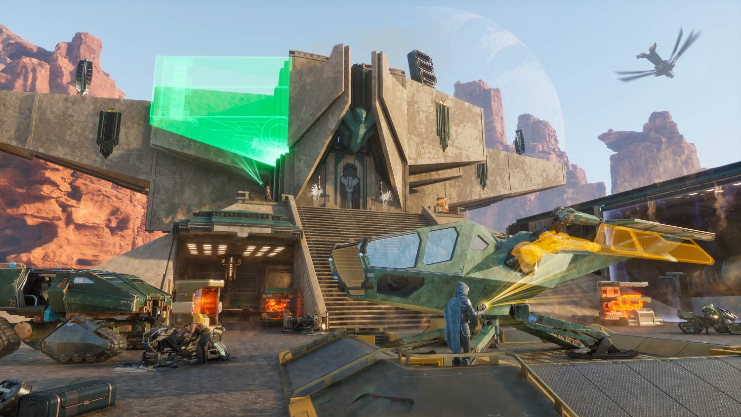 Base futurista con vehículos, una nave y una gran estructura en un planeta desértico.