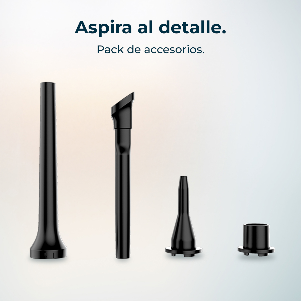 Cuatro accesorios negros para aspiradora sobre fondo claro.