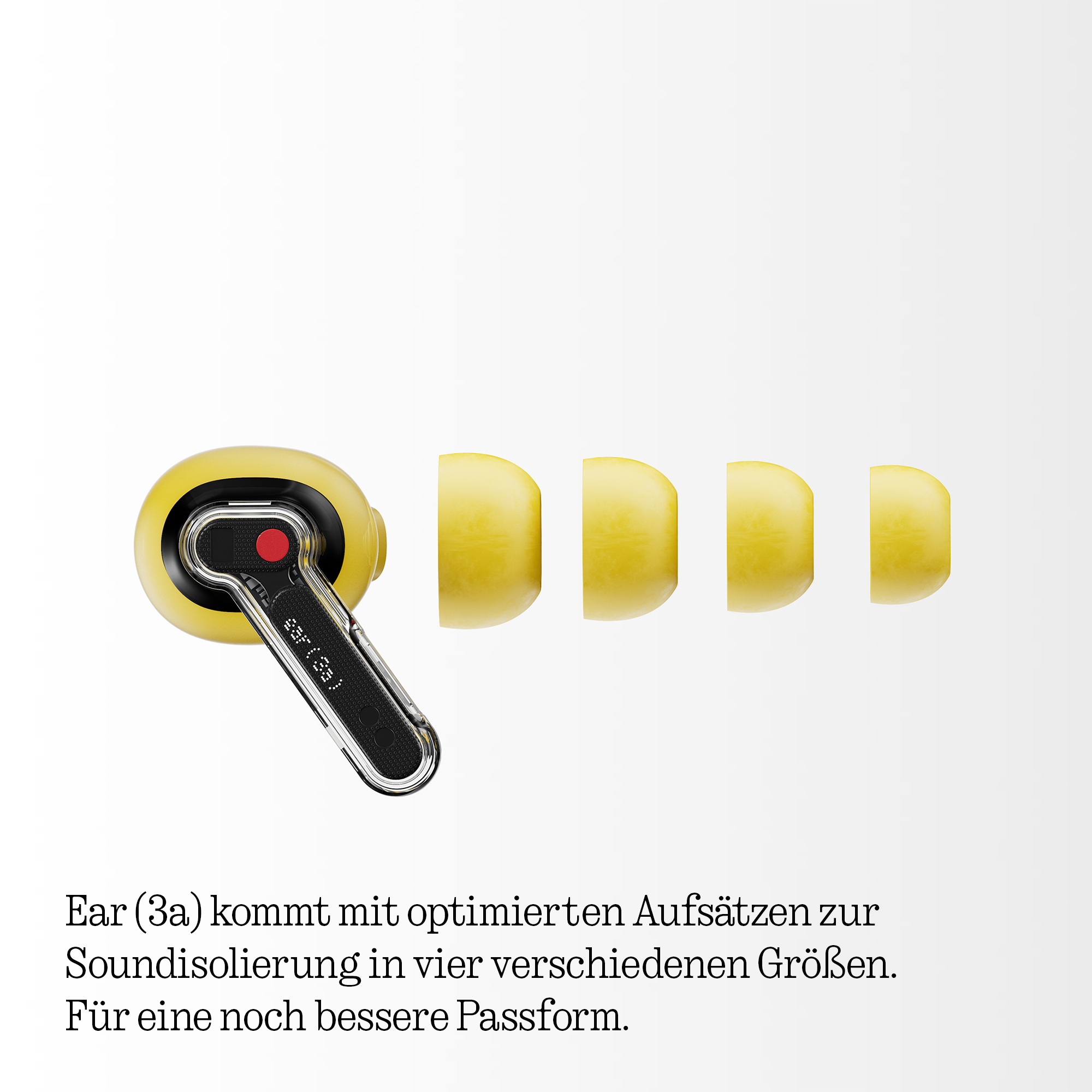Ein gelber Ohrhörer mit transparentem Stiel und vier gelben Ohrstöpseln.