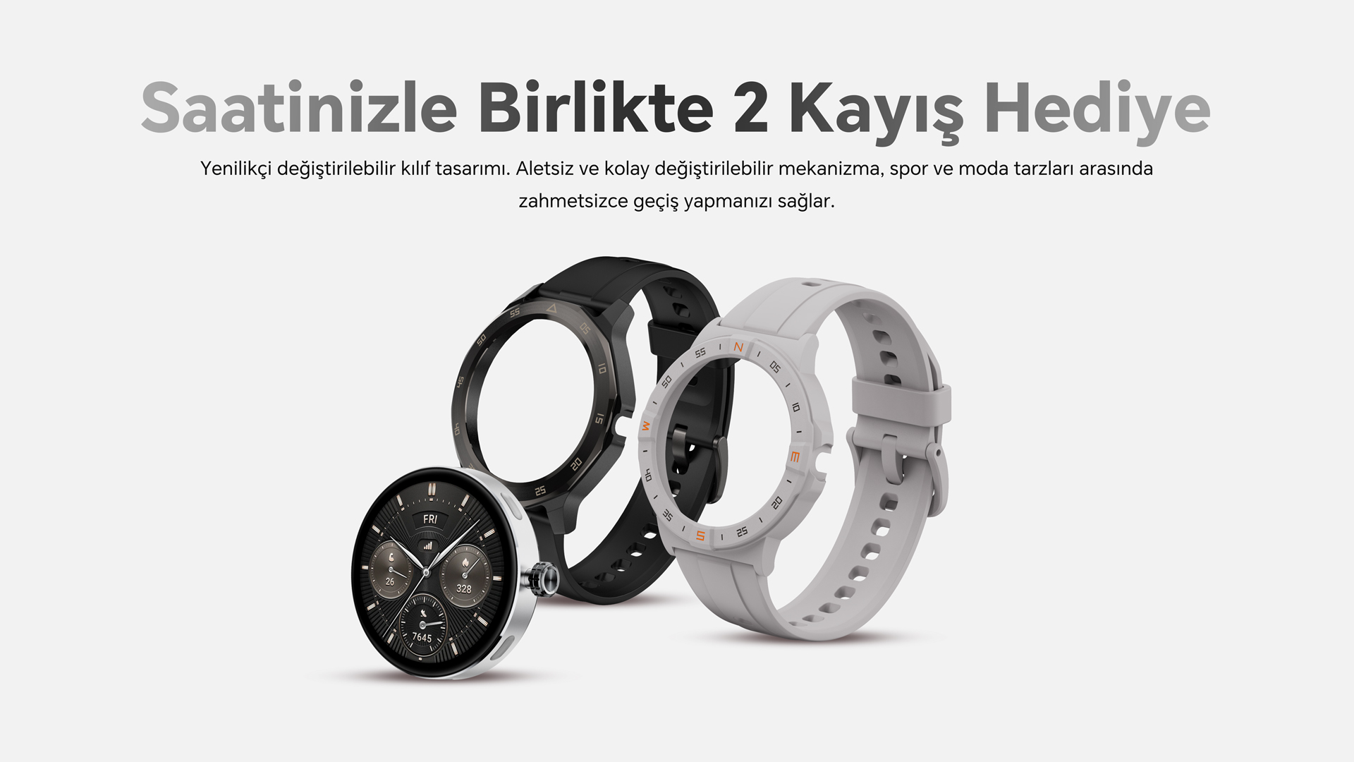 Üç akıllı saat: biri siyah, biri gri ve biri siyah kadranlı.