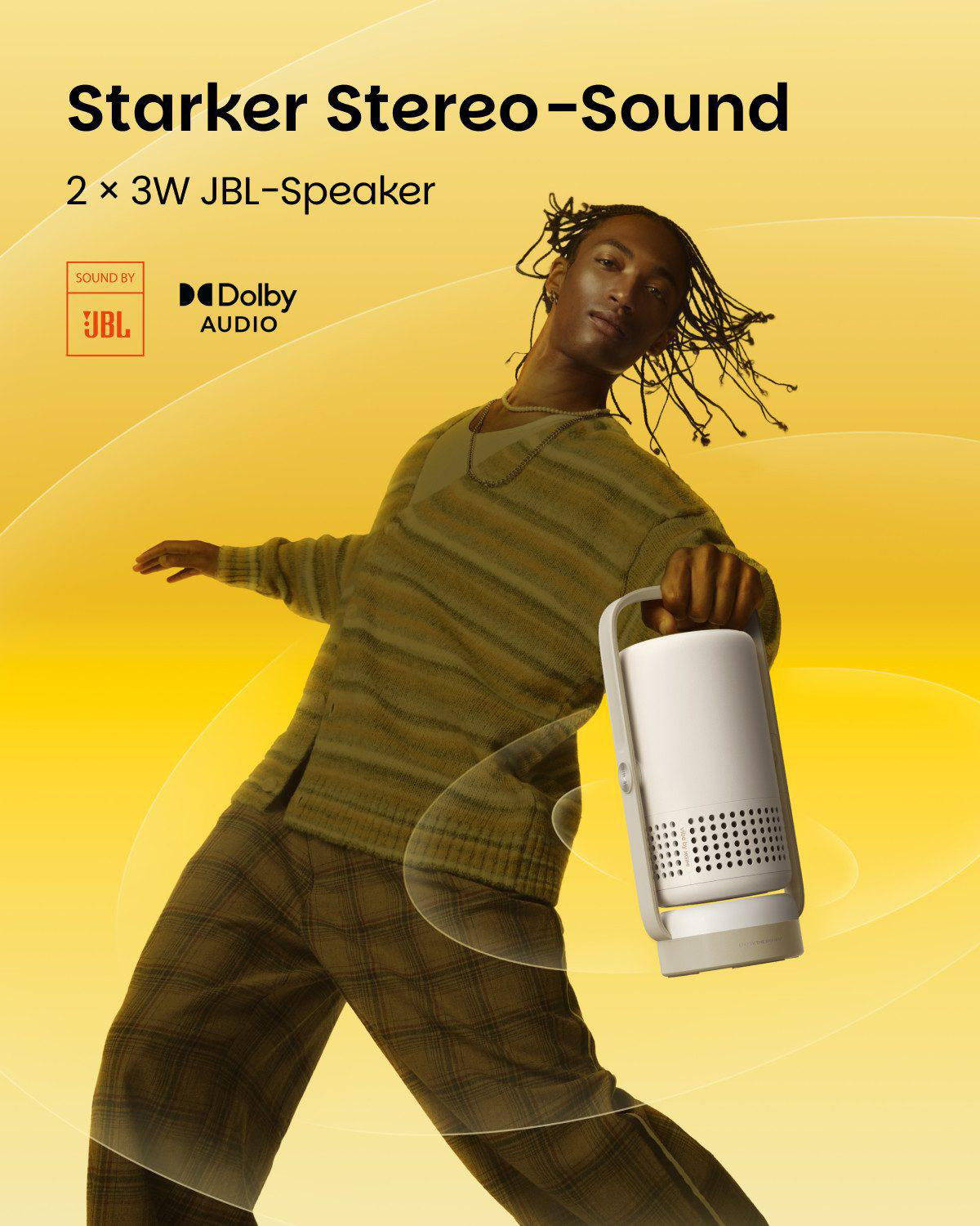 Ein Mann hält einen weißen JBL-Lautsprecher. Text: 'Starker Stereo-Sound'.