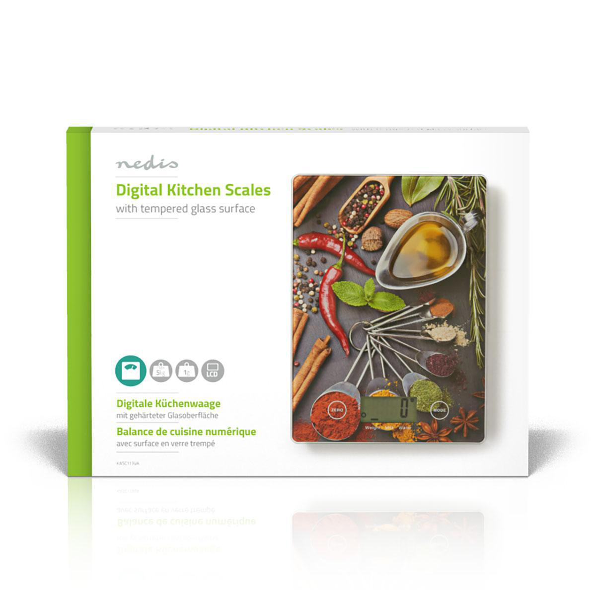 Verpackung einer digitalen Küchenwaage mit Glasoberfläche, Gewürzen und Messlöffeln.