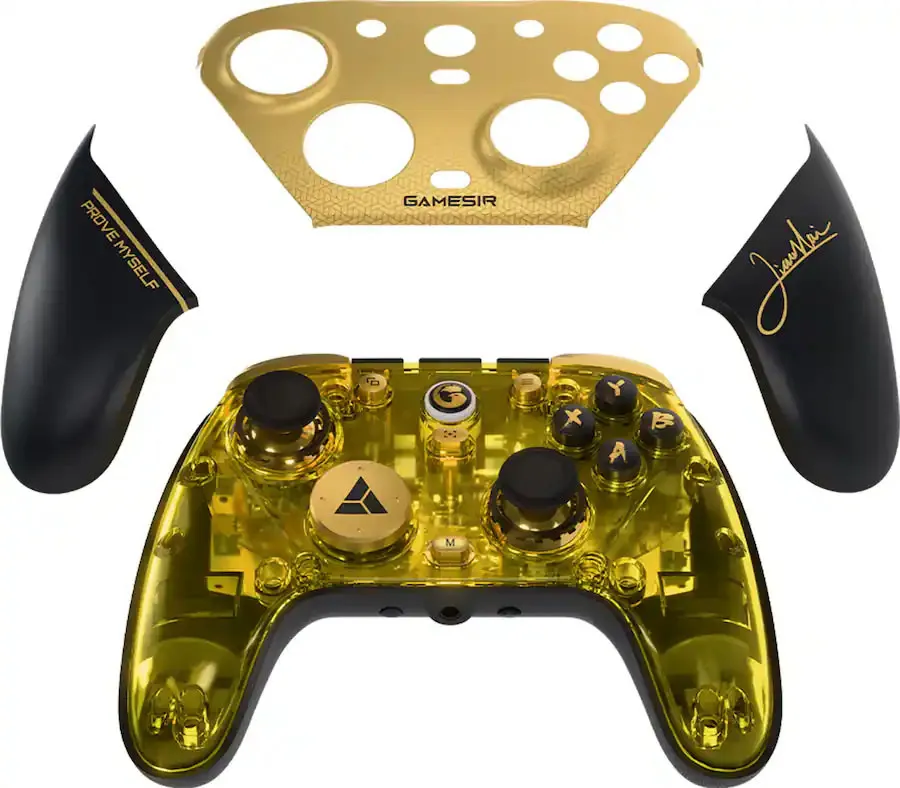 Ein transparenter gelber Controller mit goldenen Akzenten und schwarzen Griffen.