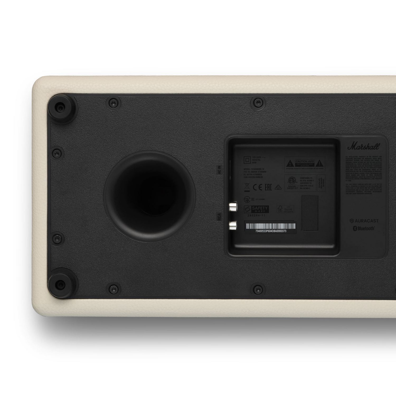 Parte trasera de un altavoz Marshall beige con puertos y logotipos.