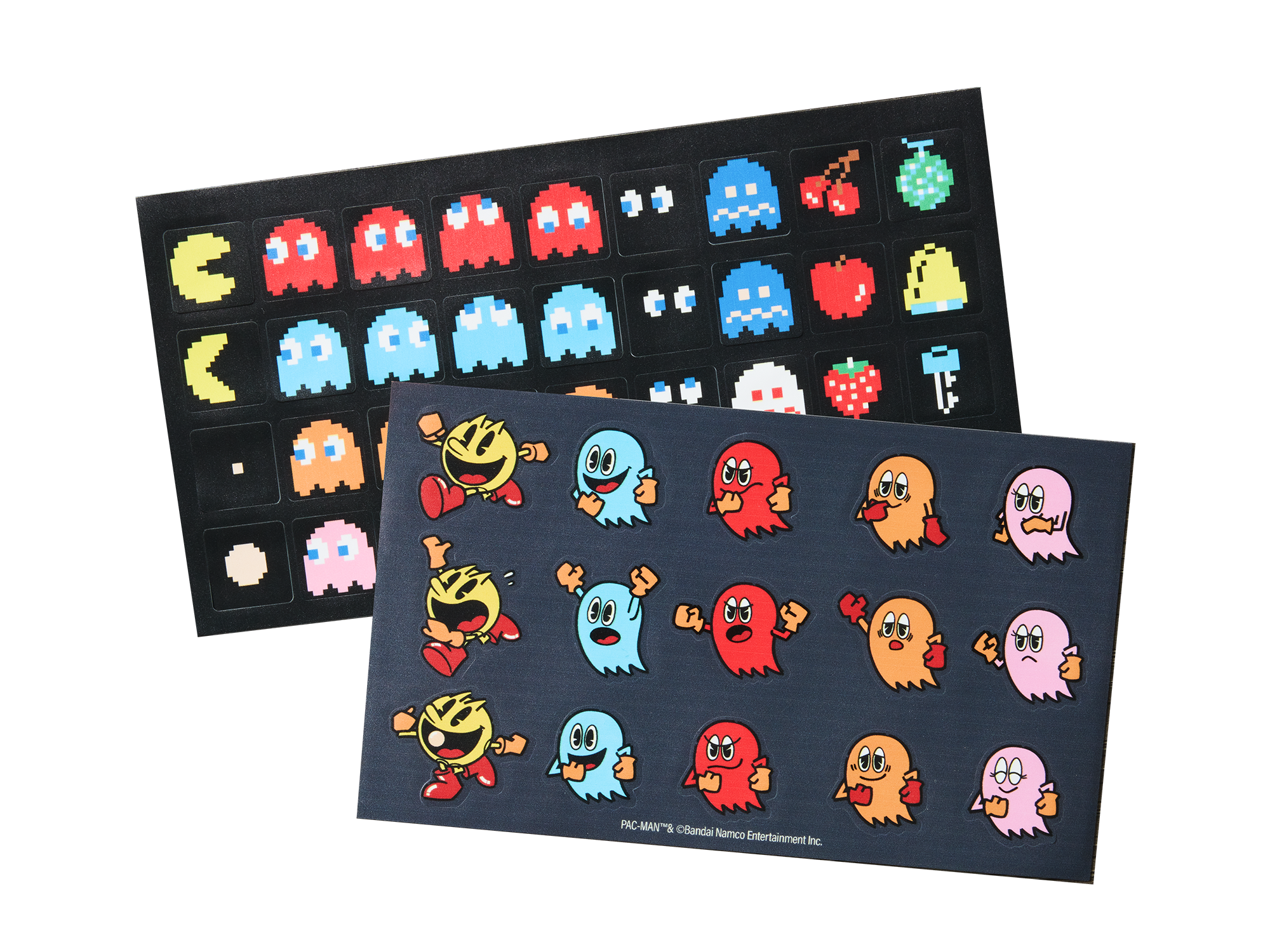 Aufkleberbögen mit Pixel-Pac-Man und Geistern in verschiedenen Farben.